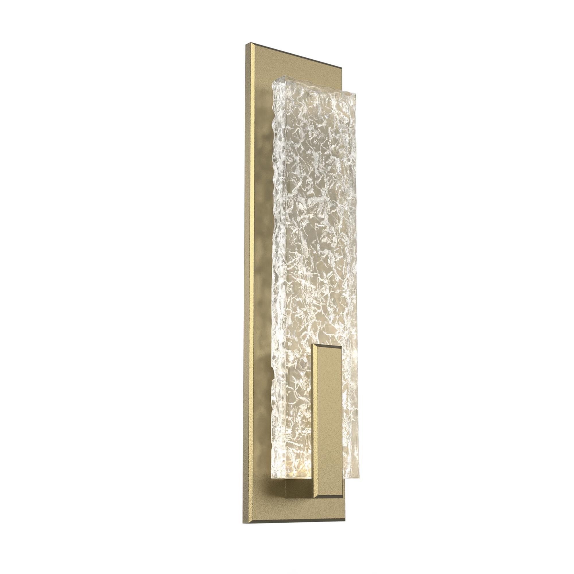 Shown in Gilded Brass finish and Clear Textured Cast glass