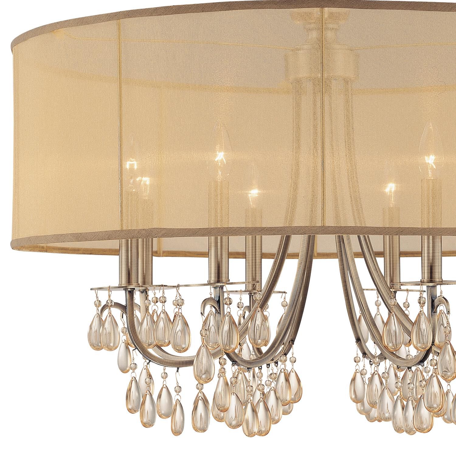Shown in Antique Brass finish and Etruscan Teardrop Almond crystal and Silk glass and Silk shade