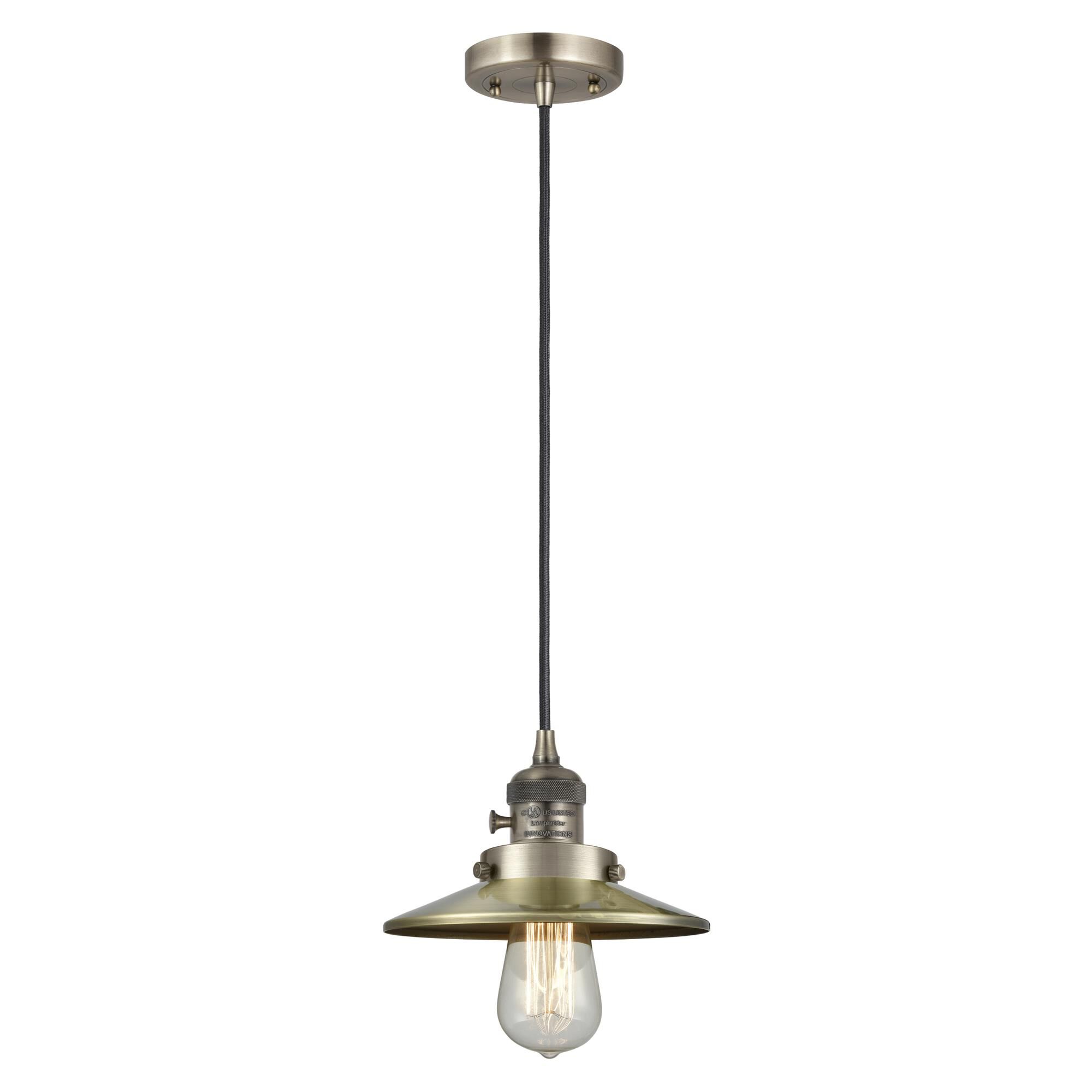 Shown in Antique Brass finish and Antique Brass shade