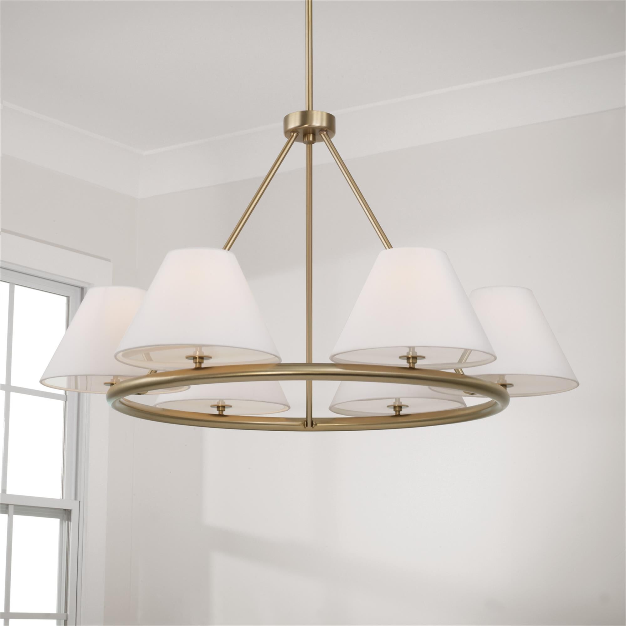 Shown in Matte Brass finish and Soft White Fabric Stay-Straight shade