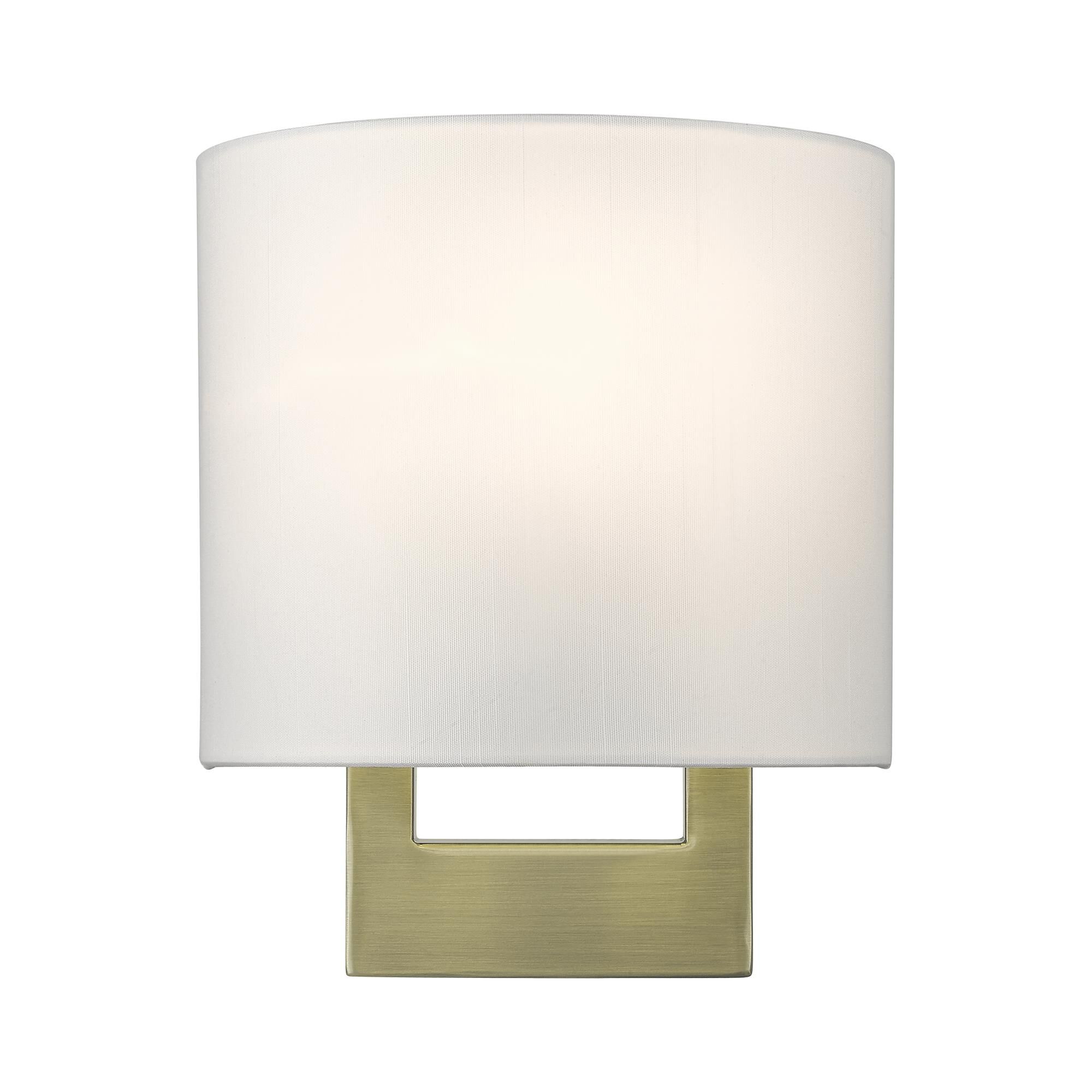 Shown in Antique Brass finish and Hand Crafted Off-White Color Hardback Fabric with White Fabric Inside shade