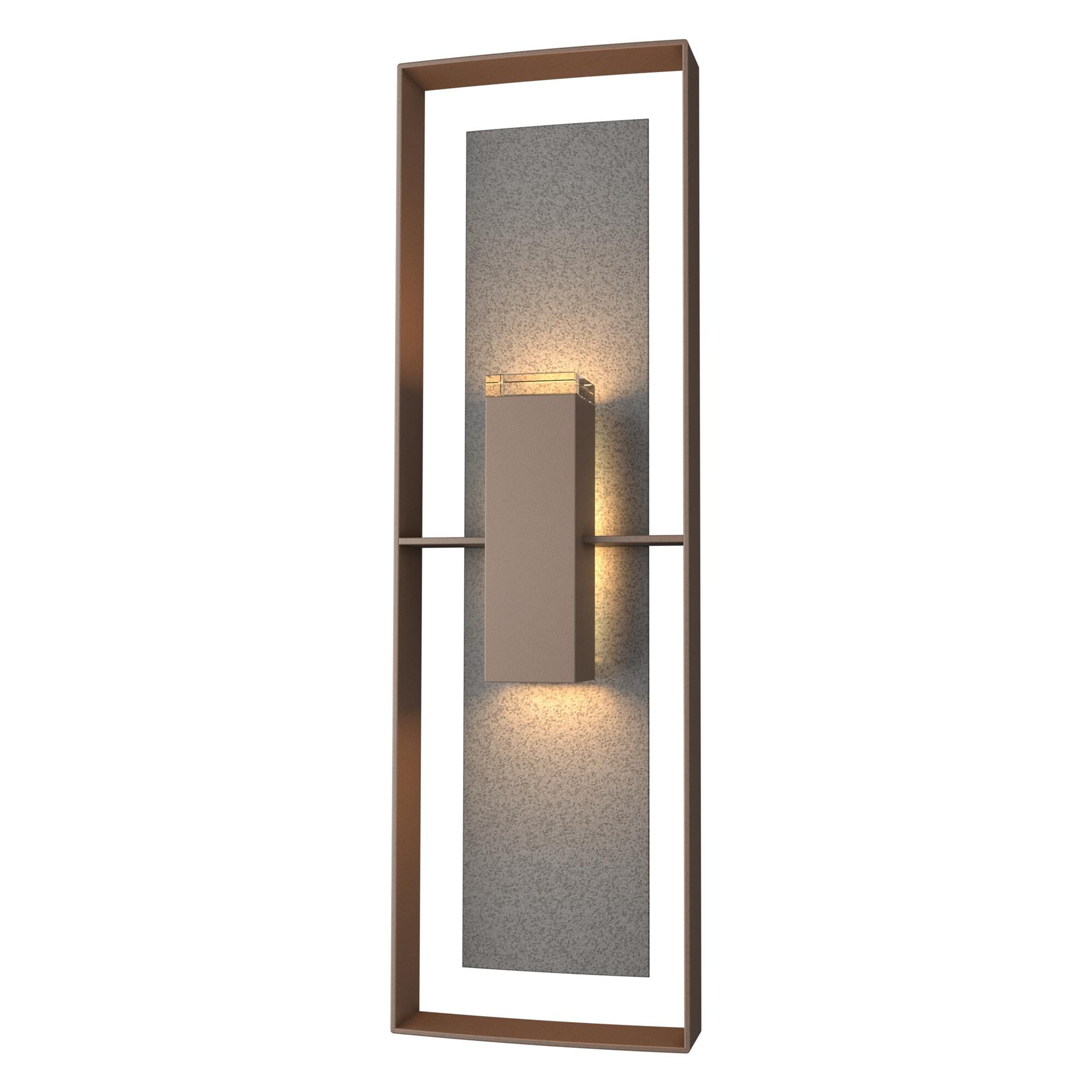 Shown in Coastal Bronze finish and Clear glass and Natural Iron accent