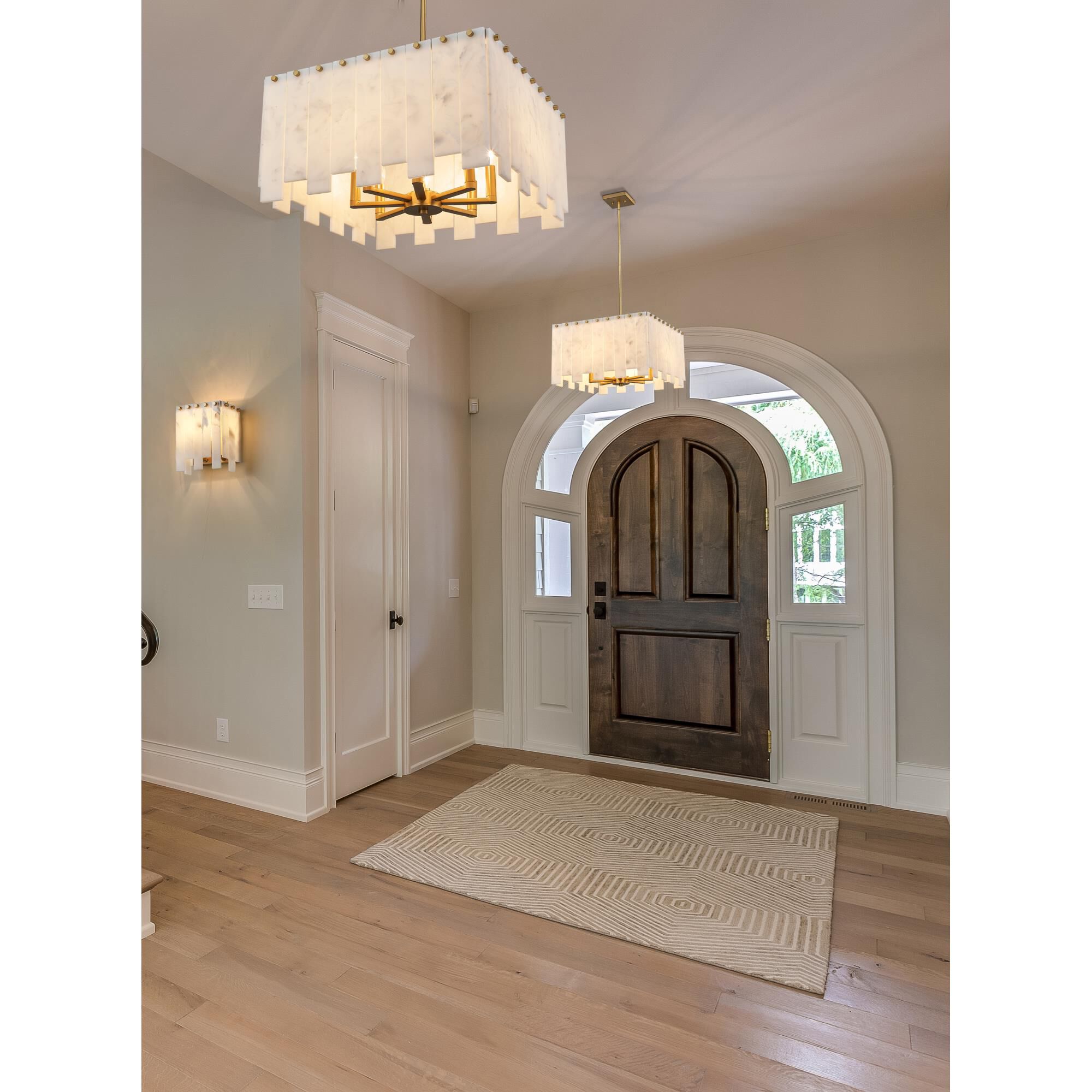 Shown in Rubbed Brass finish and Alabaster Resin shade