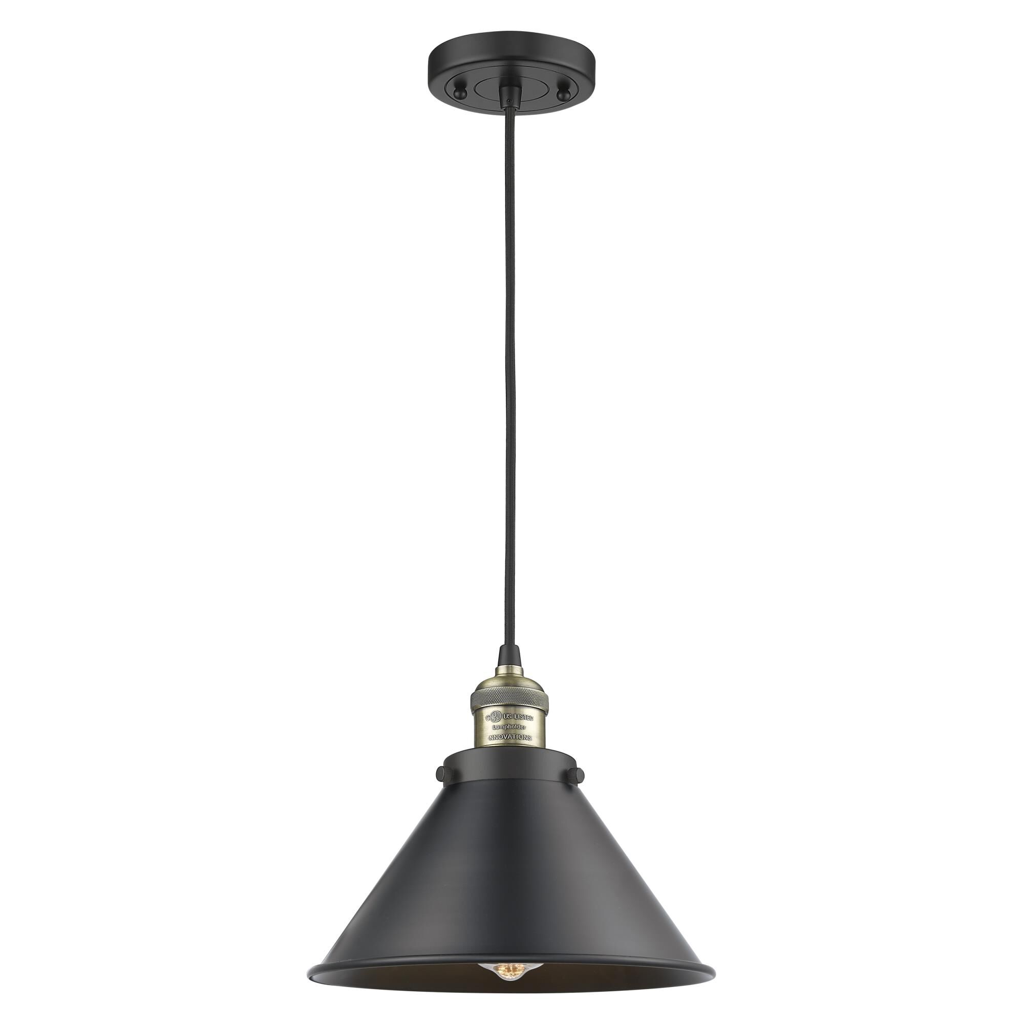Shown in Black Antique Brass finish and Matte Black shade and Cord accent