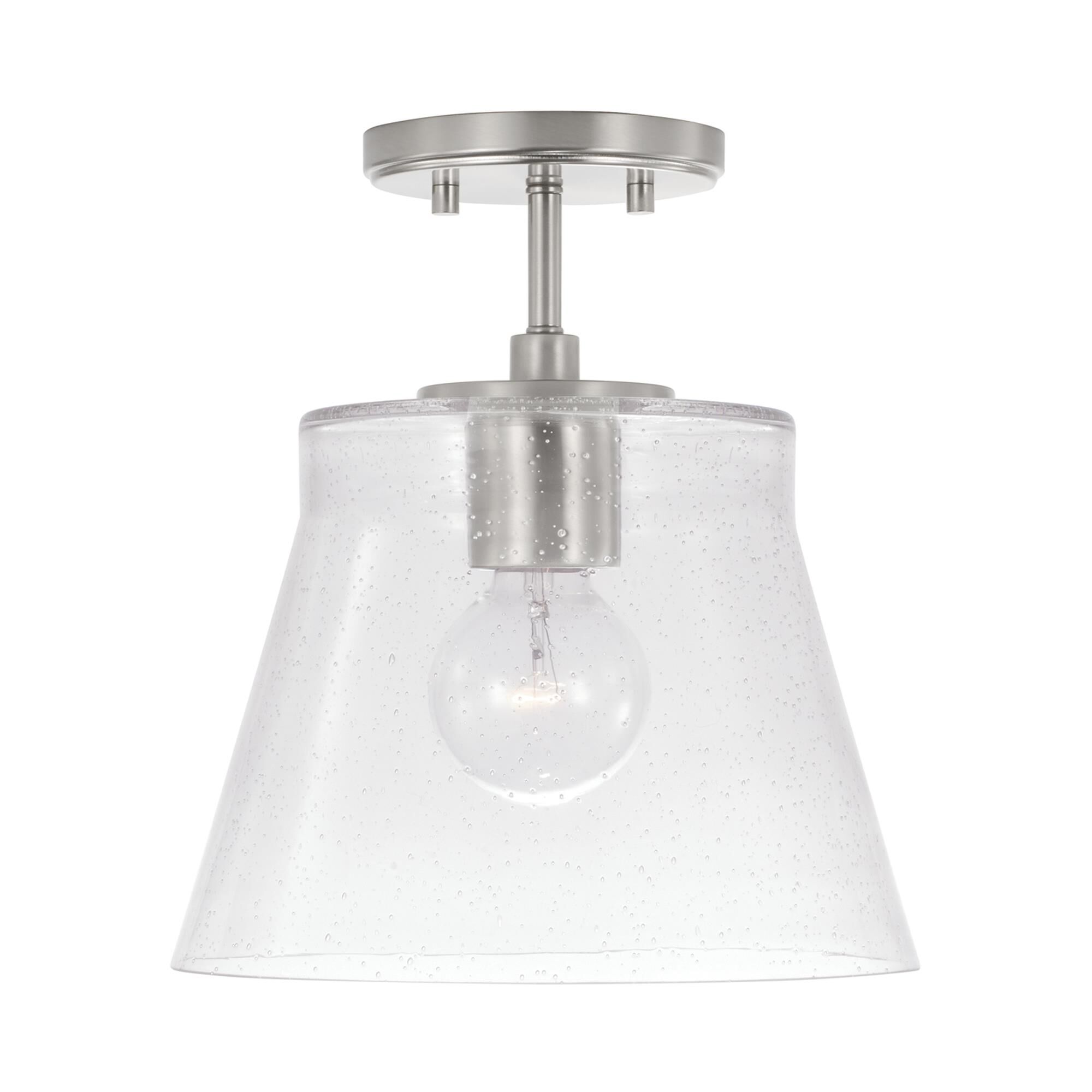 Shown in Brushed Nickel finish and Clear Seeded glass