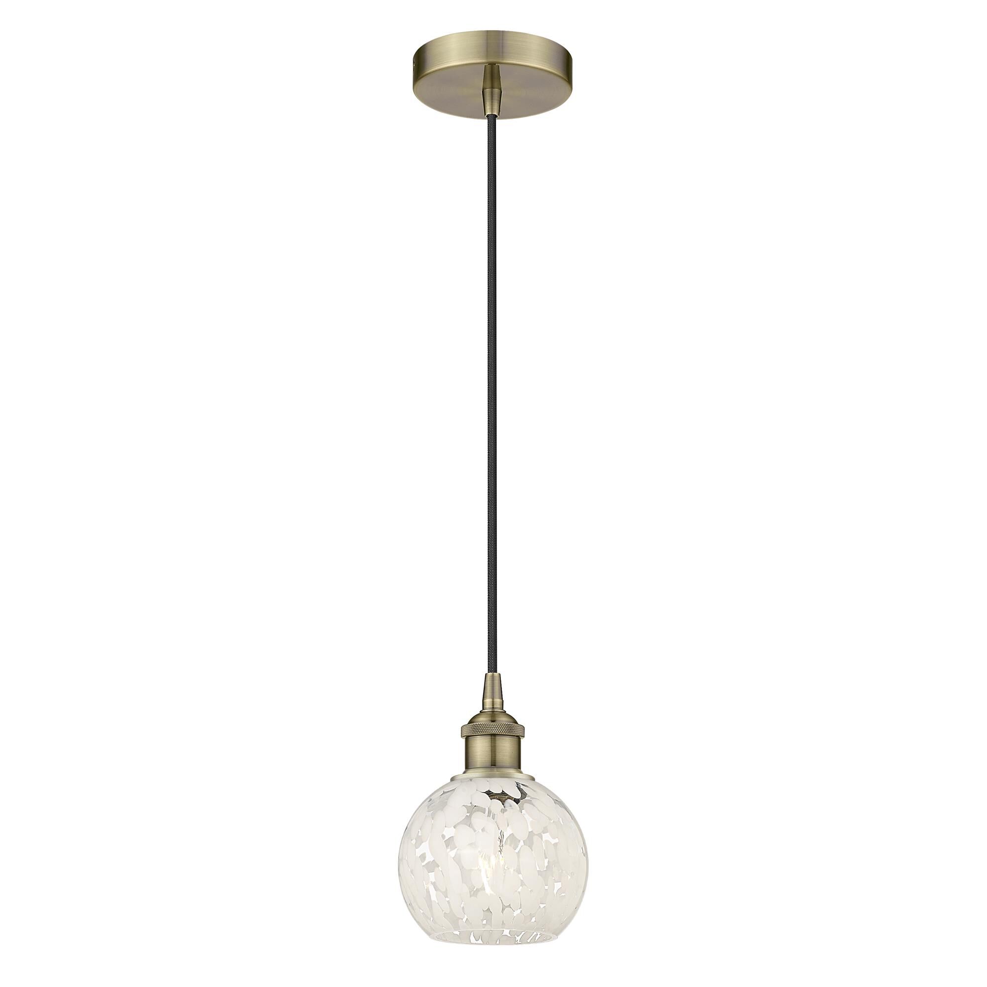 Shown in Antique Brass finish and White Mouchette glass