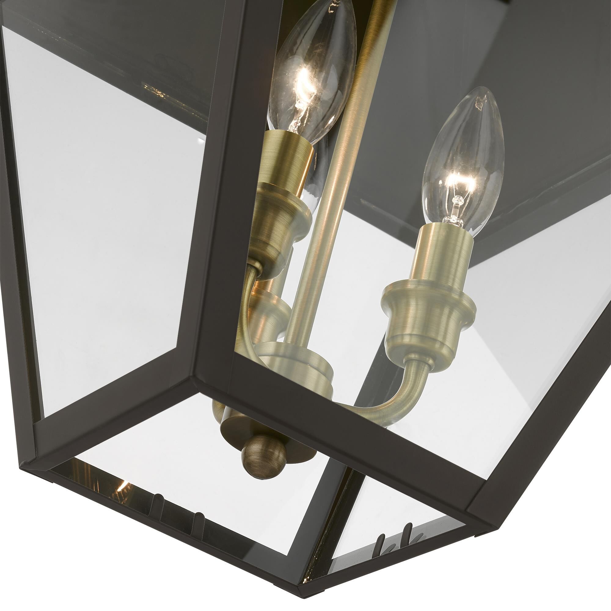 Shown in Bronze with Antique Brass Finish Cluster finish and Clear glass