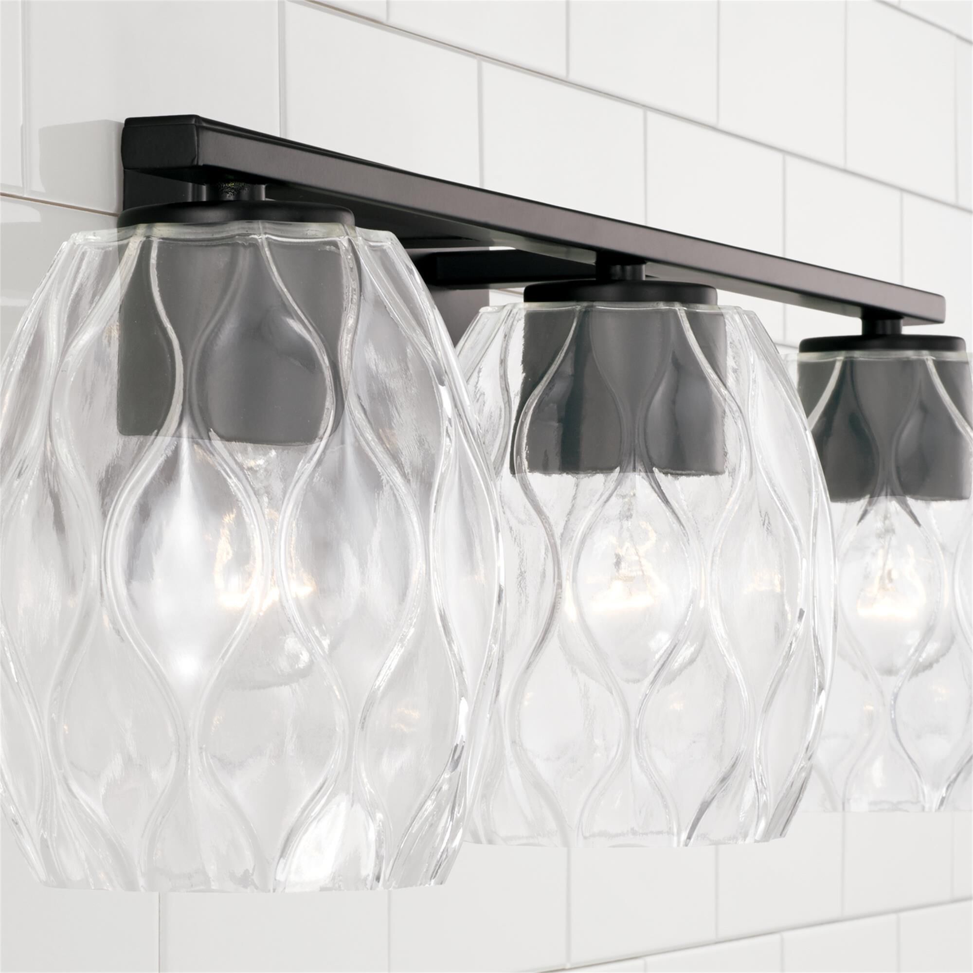 Shown in Matte Black finish and Wavy Embossed glass