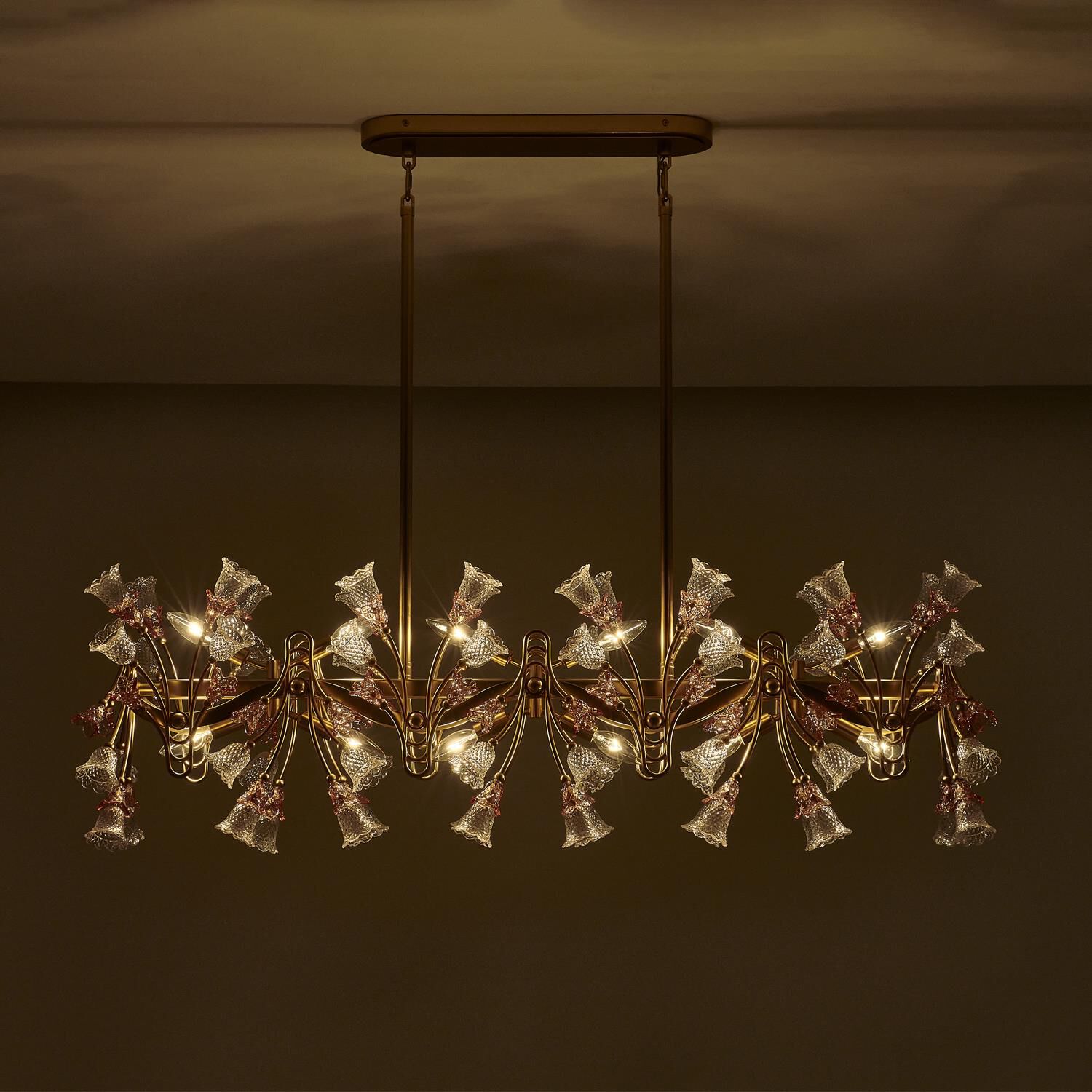 Shown in Antique Brass finish and Vintage Rose crystal