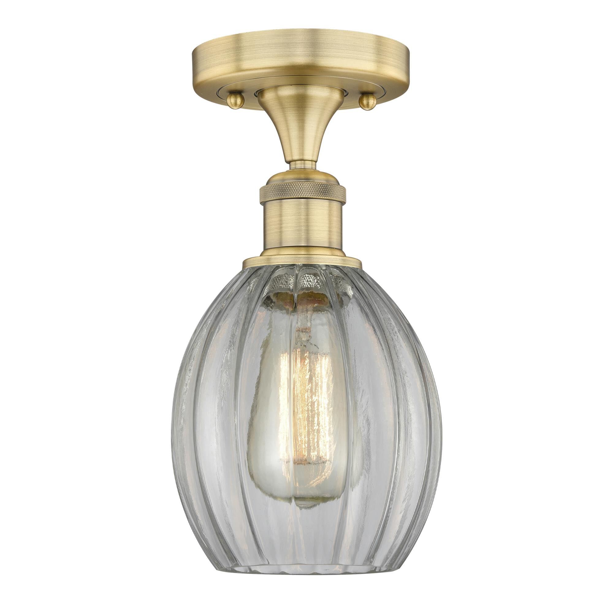 Shown in Brushed Brass finish and Clear glass