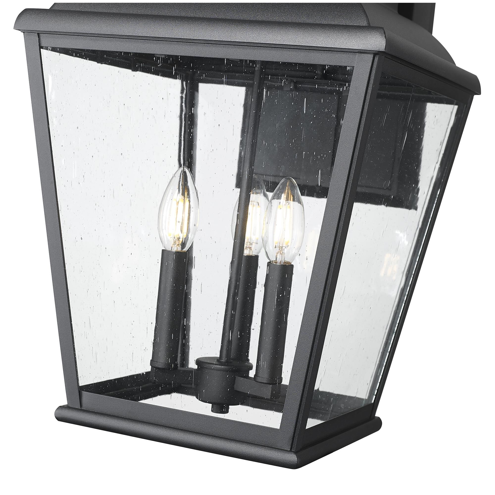 Shown in Sand Black finish and Clear Seedy glass