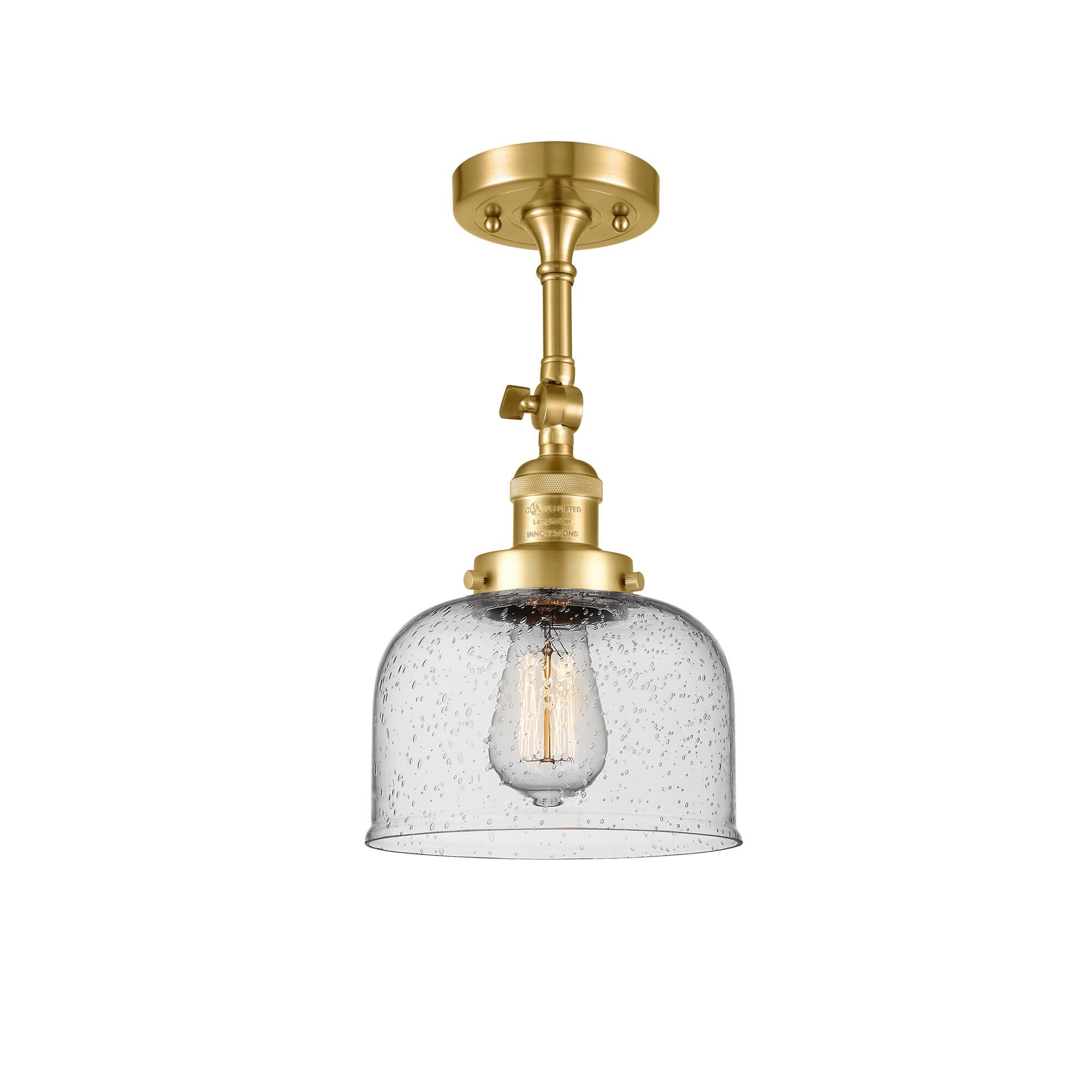 Shown in Satin Gold finish and Seedy glass and None accent