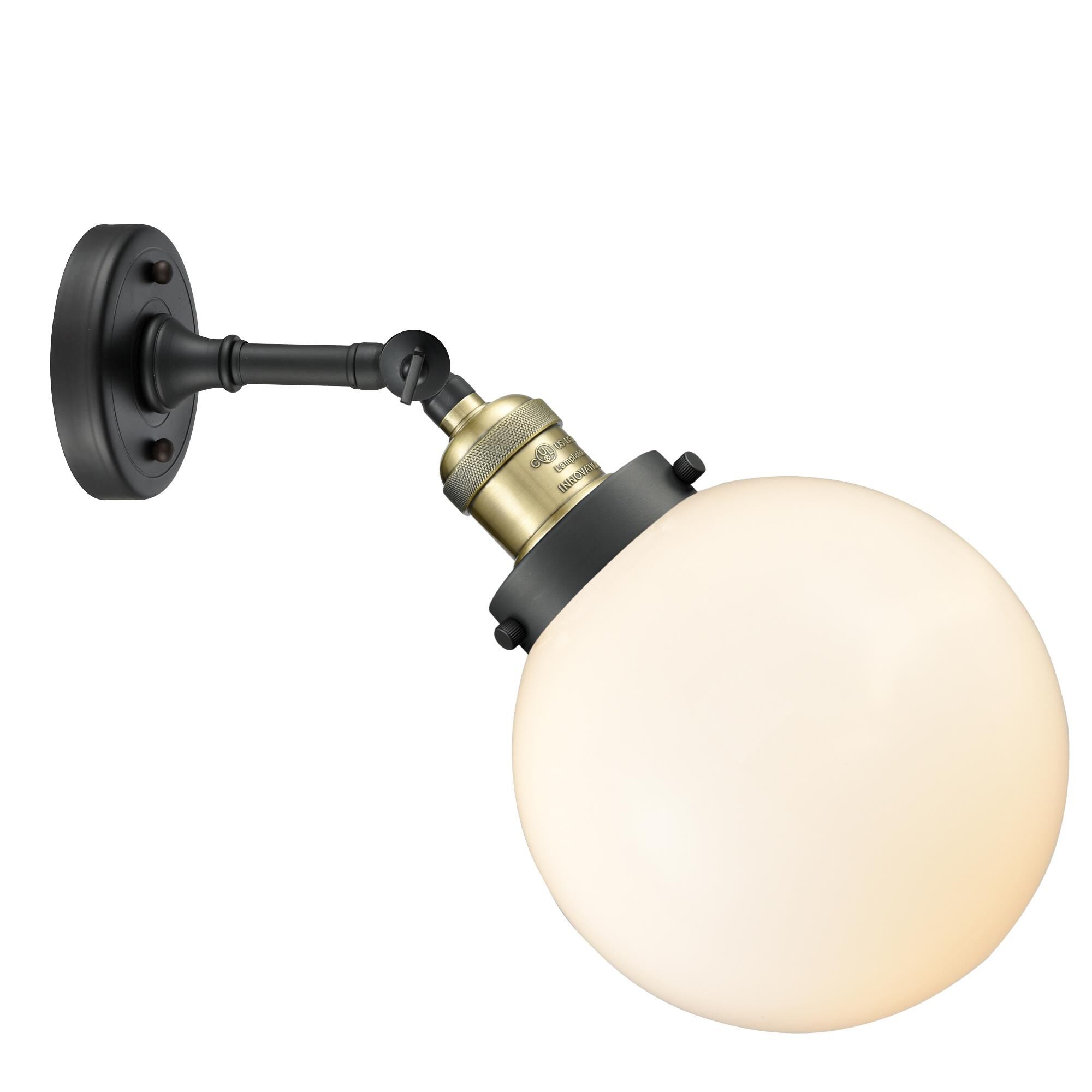 Shown in Black Antique Brass finish and Matte White Cased glass and No Accent accent