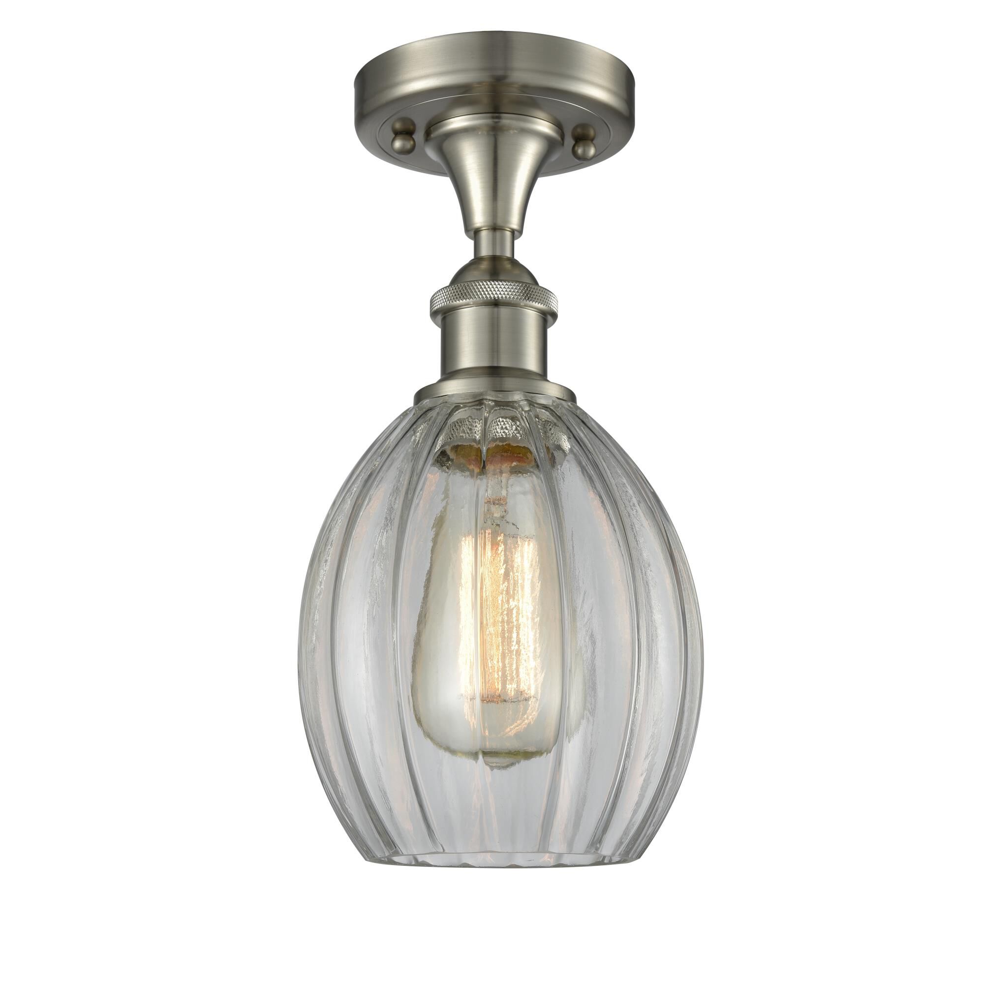 Shown in Brushed Satin Nickel finish and Clear Fluted glass