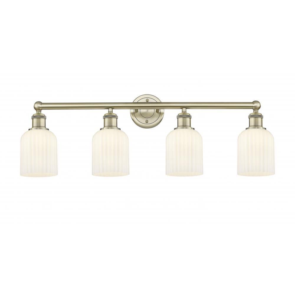 Shown in Antique Brass finish and Gloss White glass