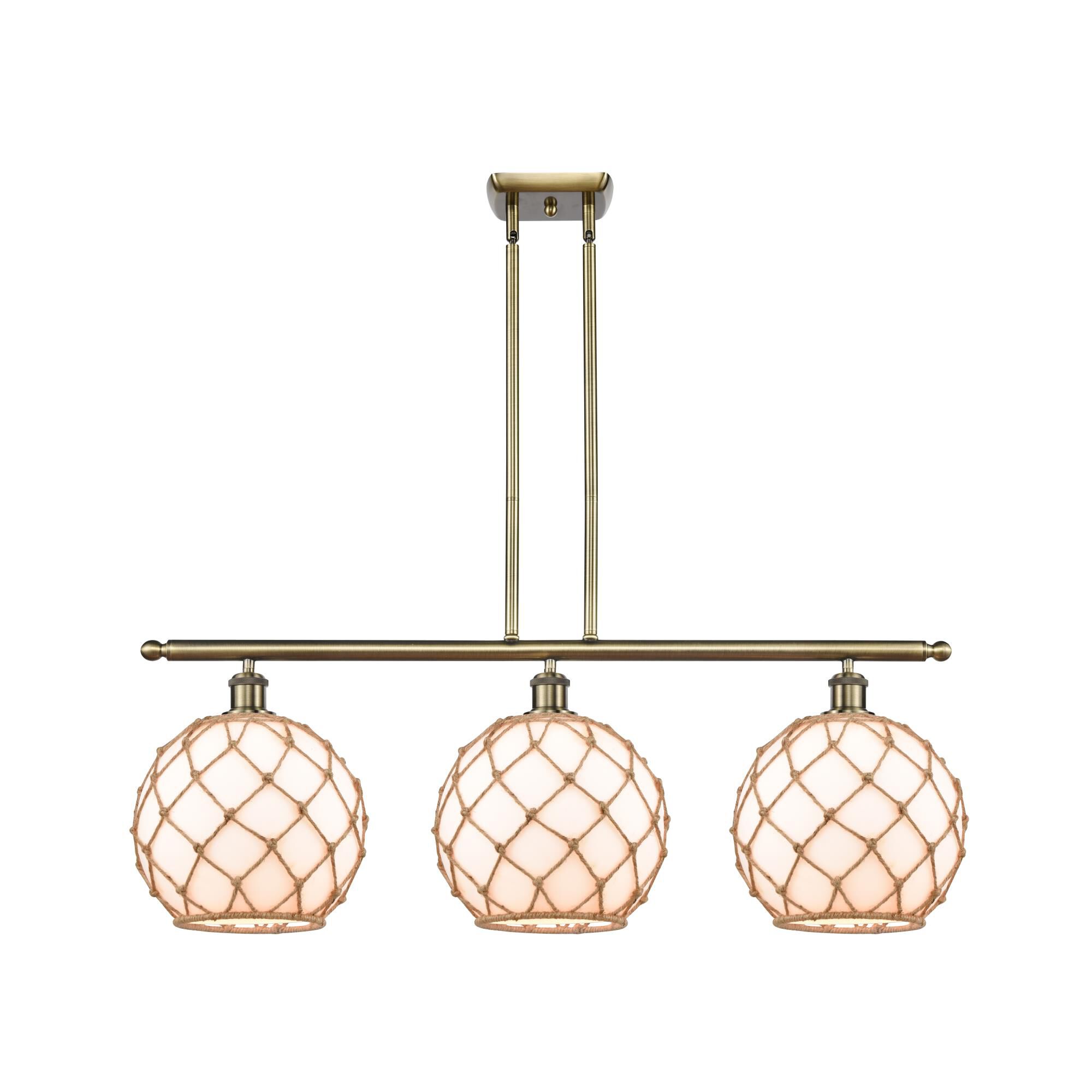 Shown in Antique Brass finish and Sphere glass and Glass And Rope shade