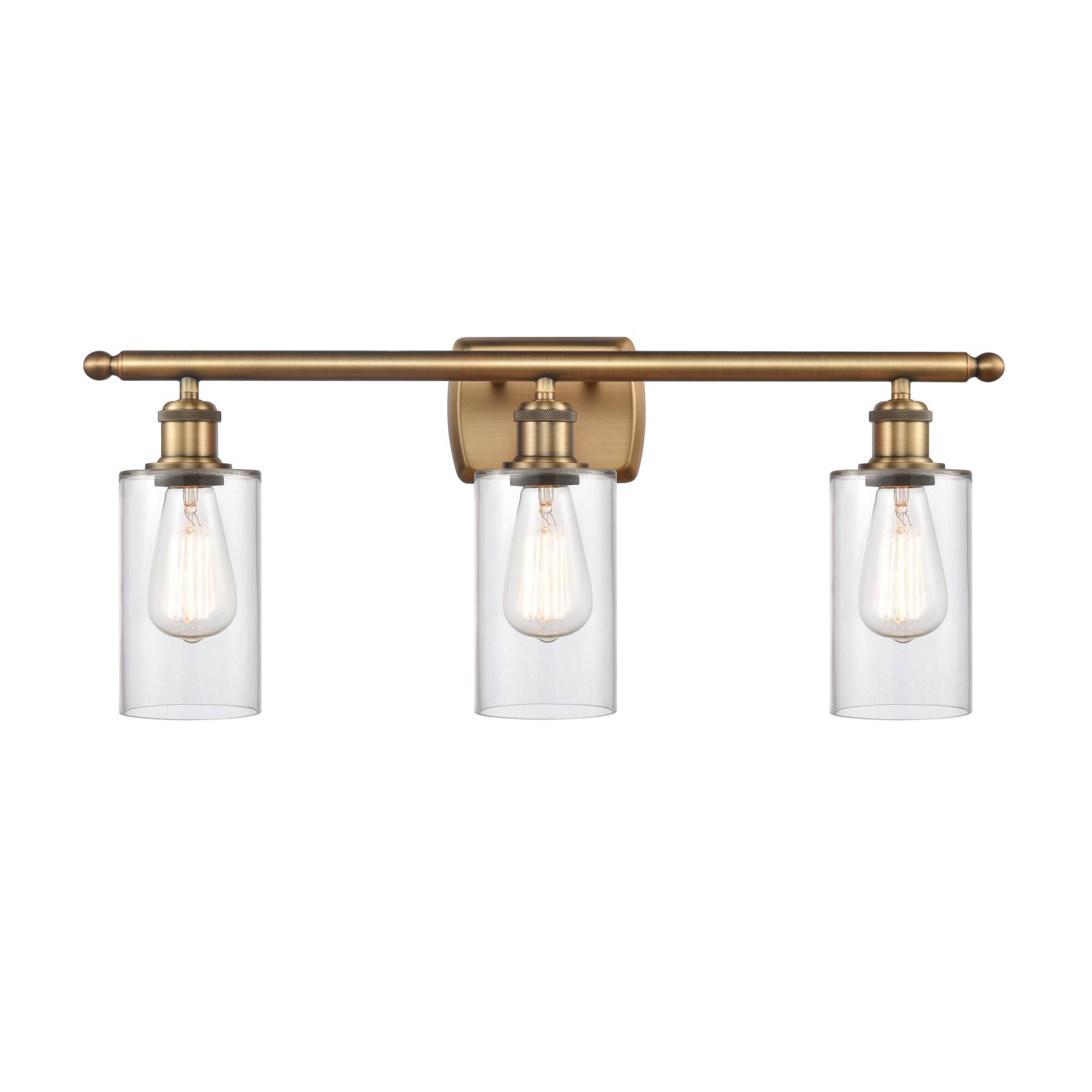 Shown in Brushed Brass finish and Clear Clymer glass