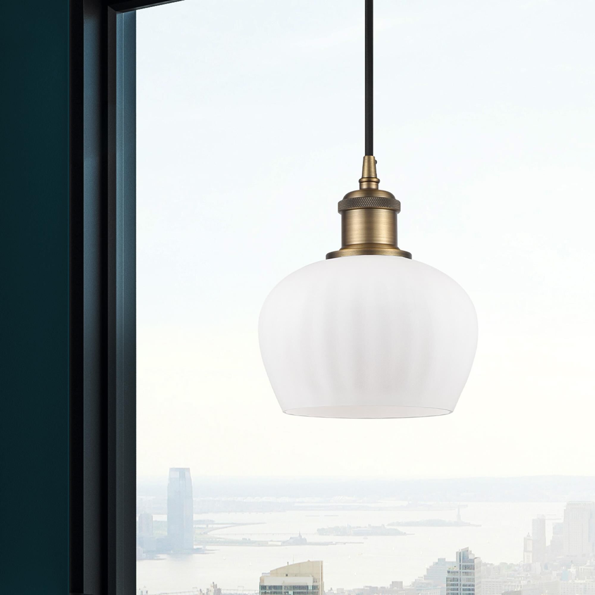 Shown in Brushed Brass finish and Matte White Fenton glass and Matte Black Smithfield shade and Polished Chrome accent