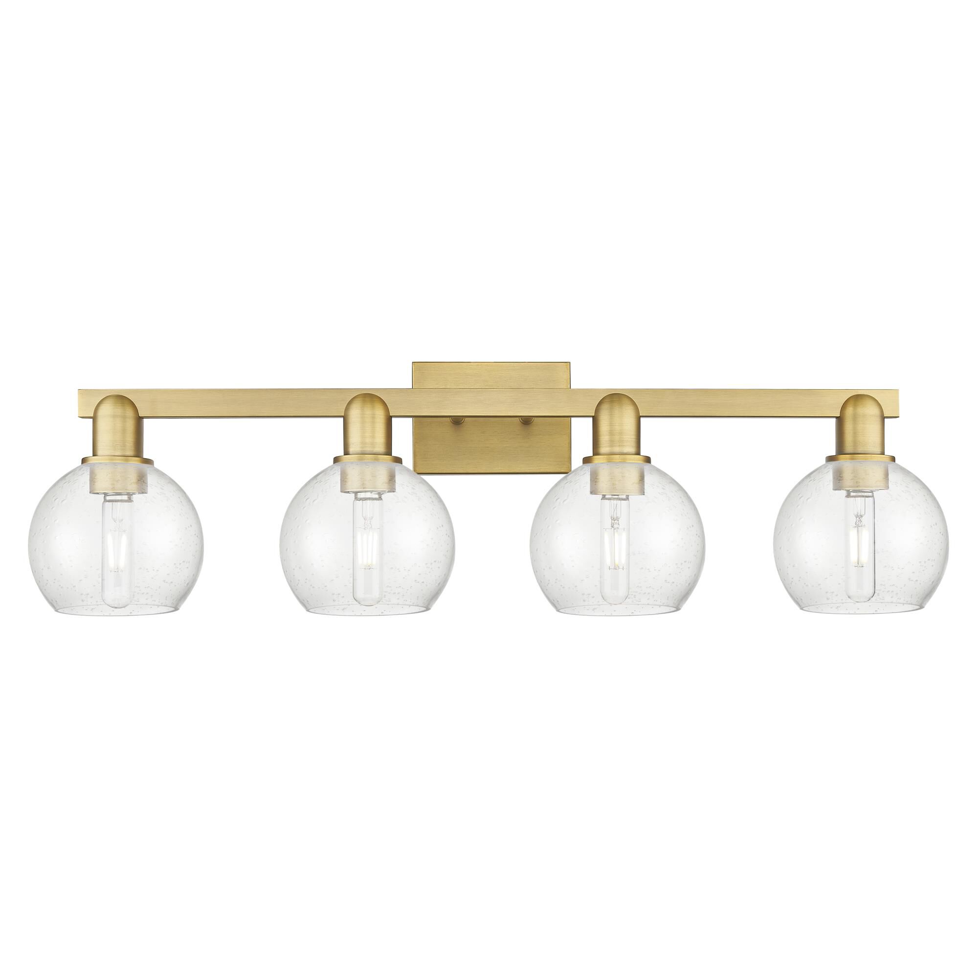 Shown in Brushed Brass finish and Seedy glass