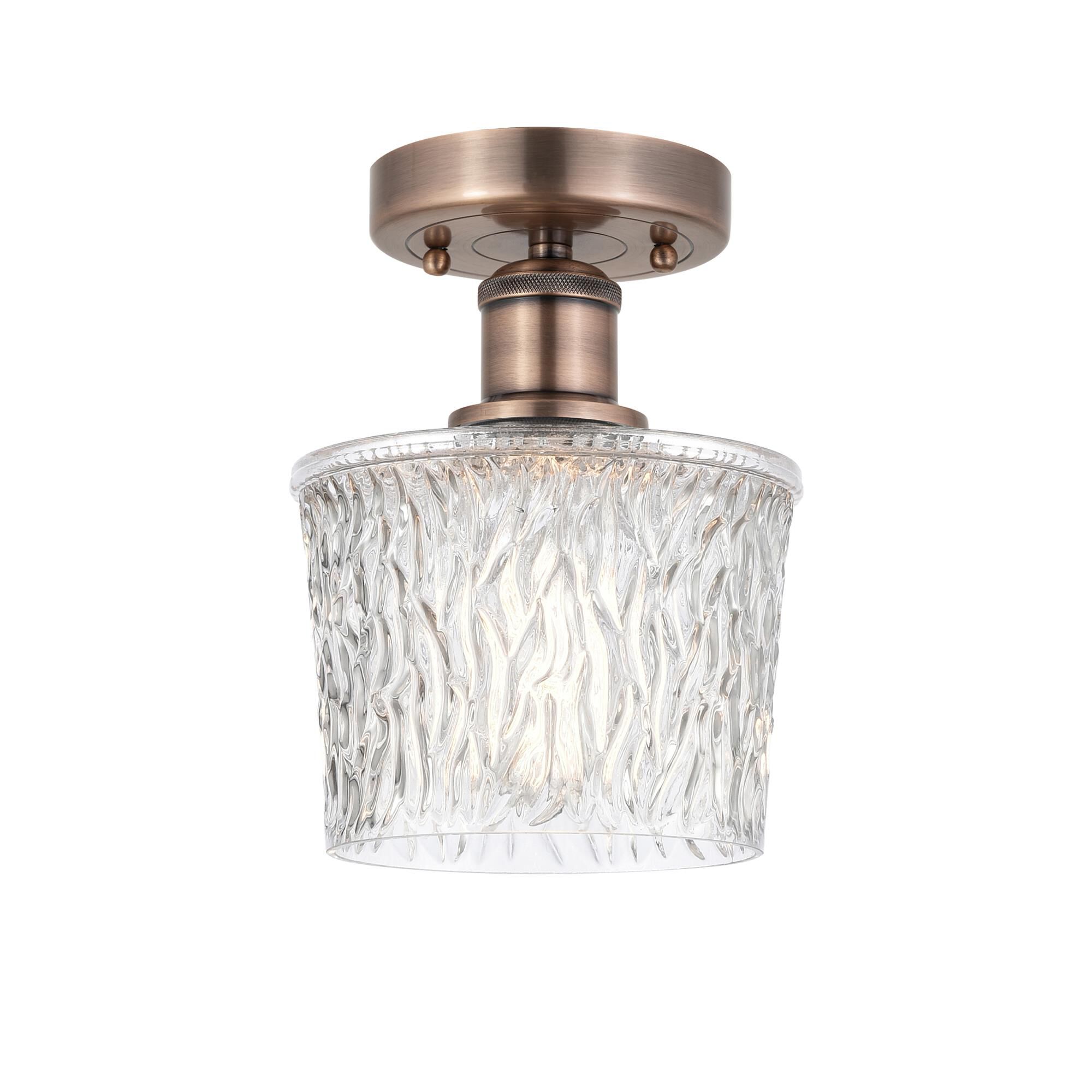 Shown in Antique Copper finish and Clear glass