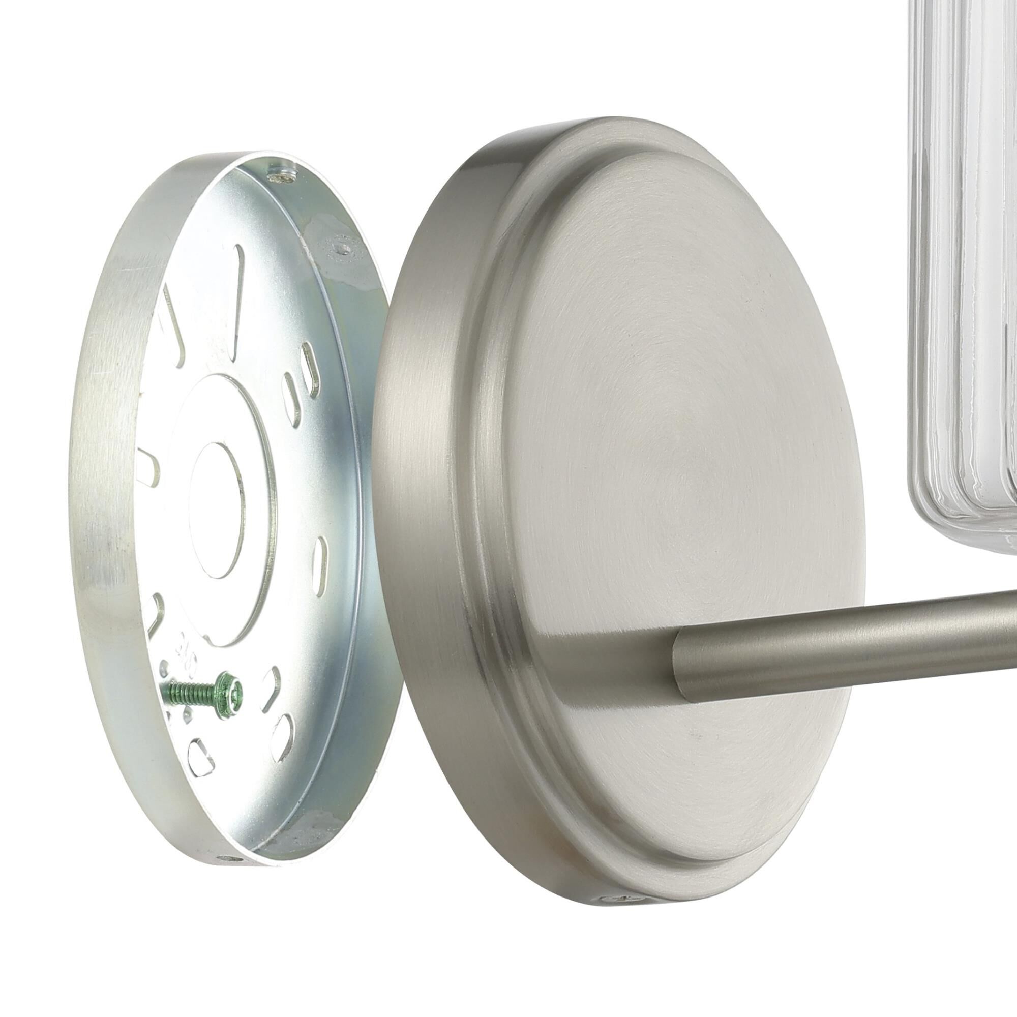 Shown in Brushed Nickel finish and Clear Ribbed glass