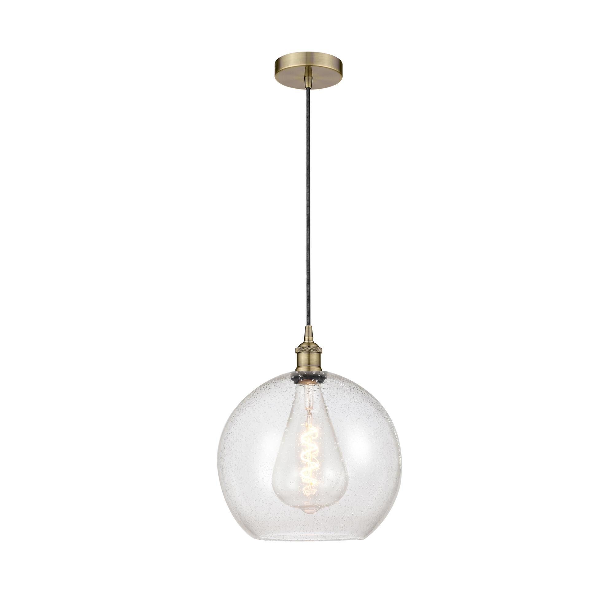 Shown in Antique Brass finish and Seedy Large Athens glass