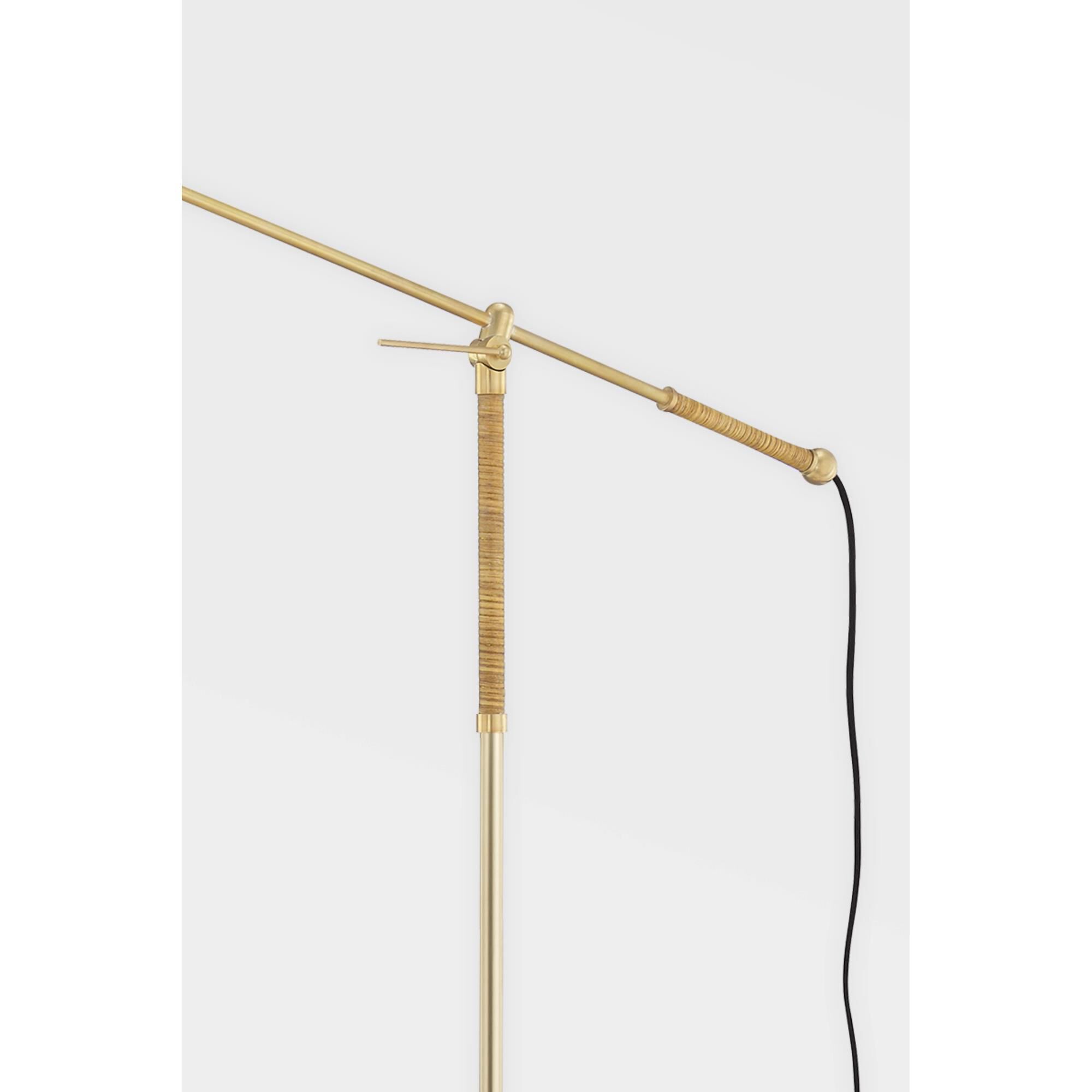 Shown in Aged Brass finish and Linen shade