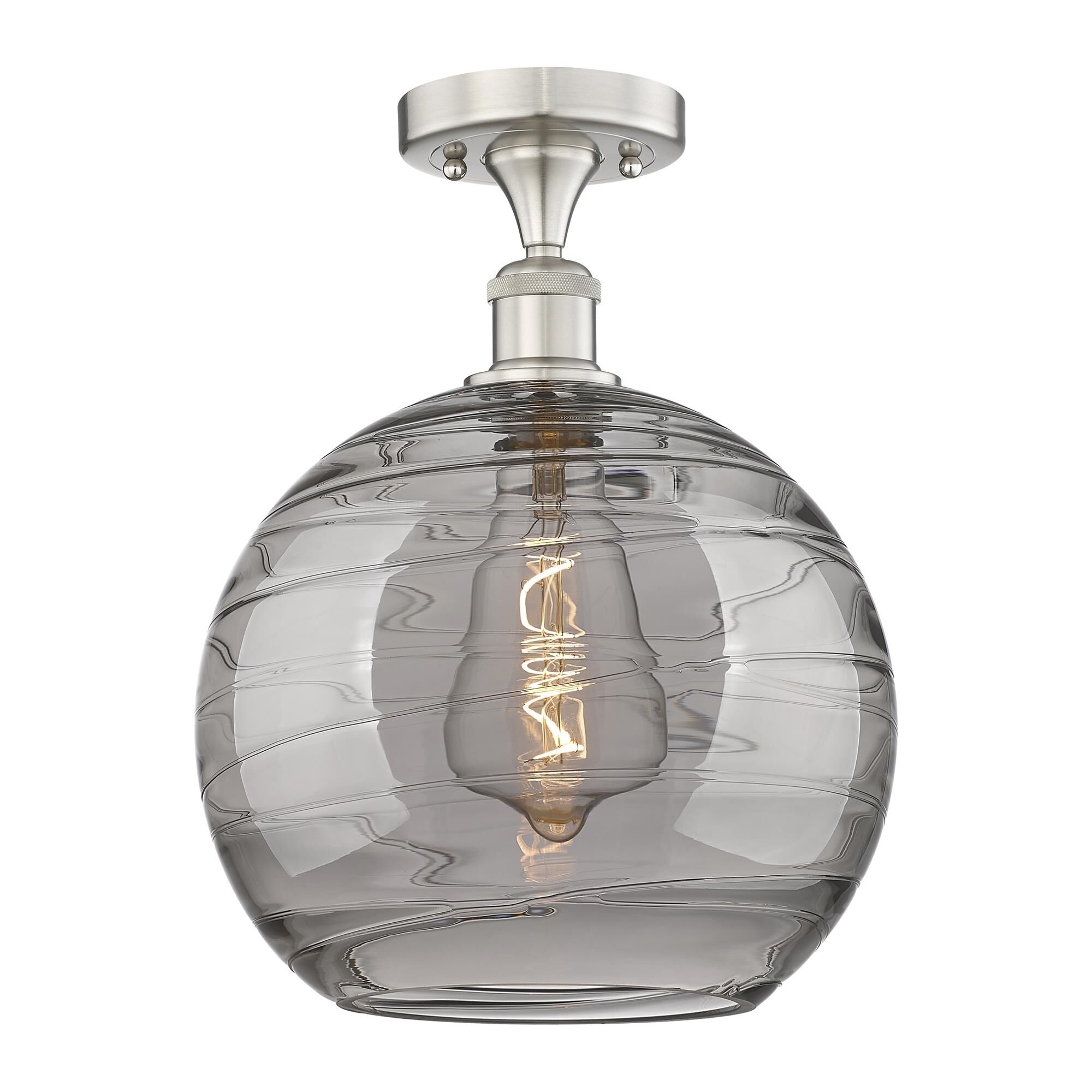 Shown in Brushed Satin Nickel finish and Light Smoke Deco Swirl glass