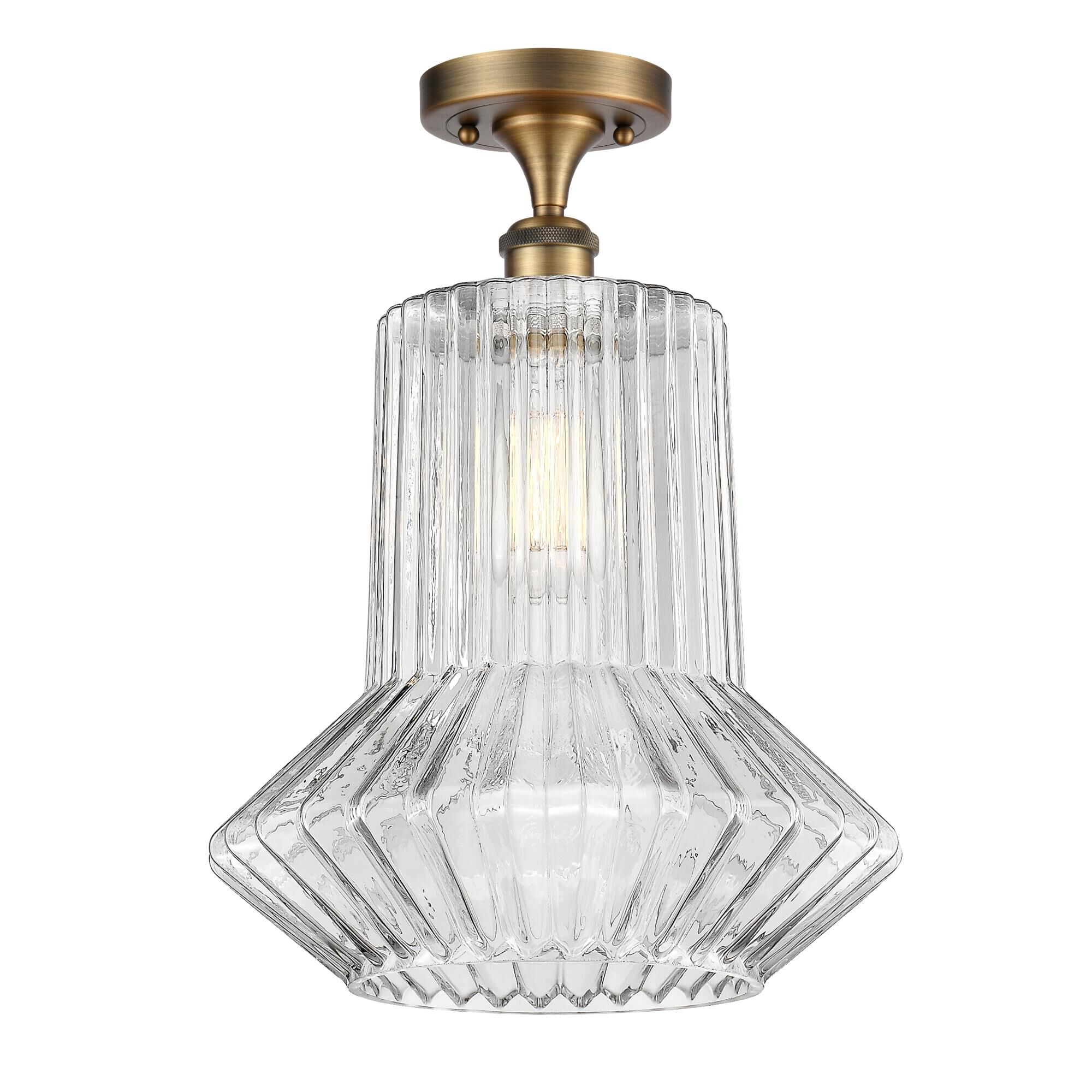 Shown in Brushed Brass finish and Novelty glass and Glass shade