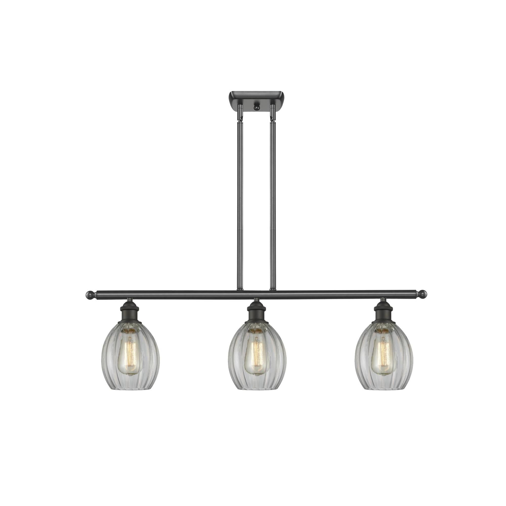 Shown in Oil Rubbed Bronze finish and Clear Fluted glass