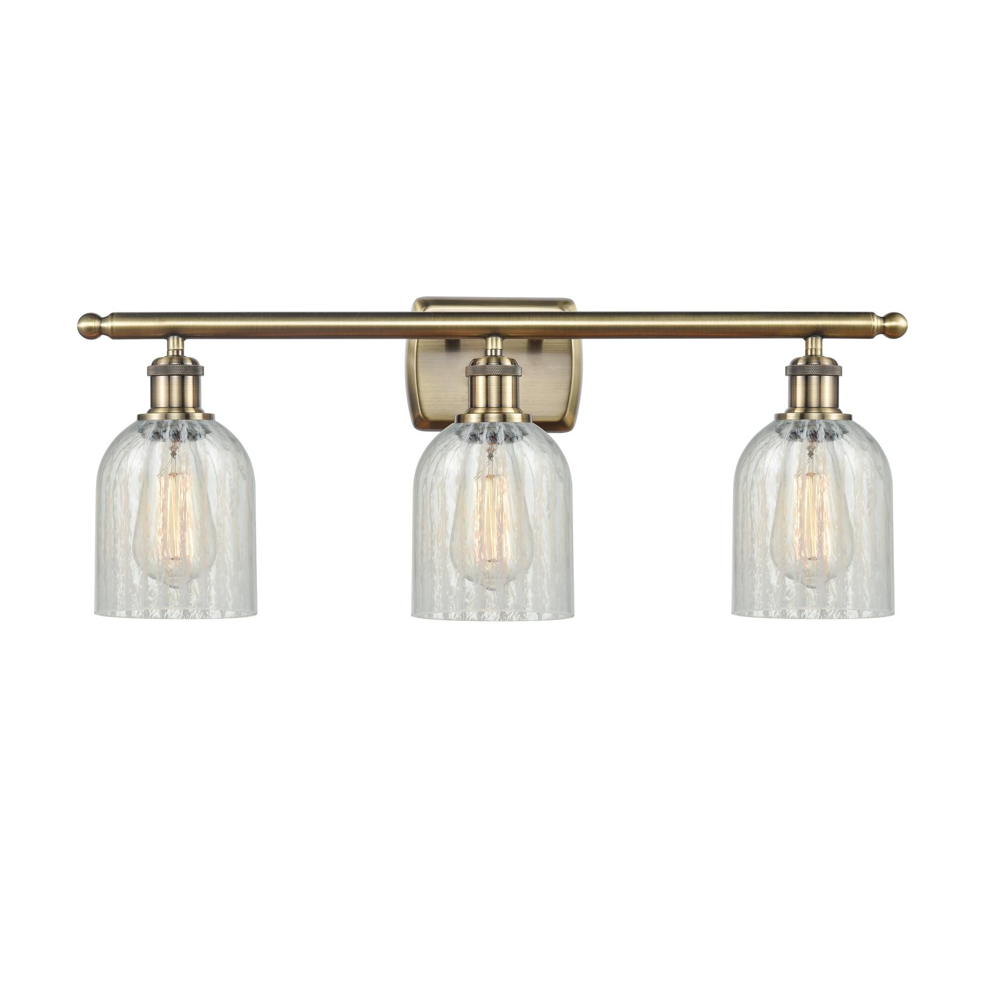 Shown in Antique Brass finish and Bell glass and Glass shade