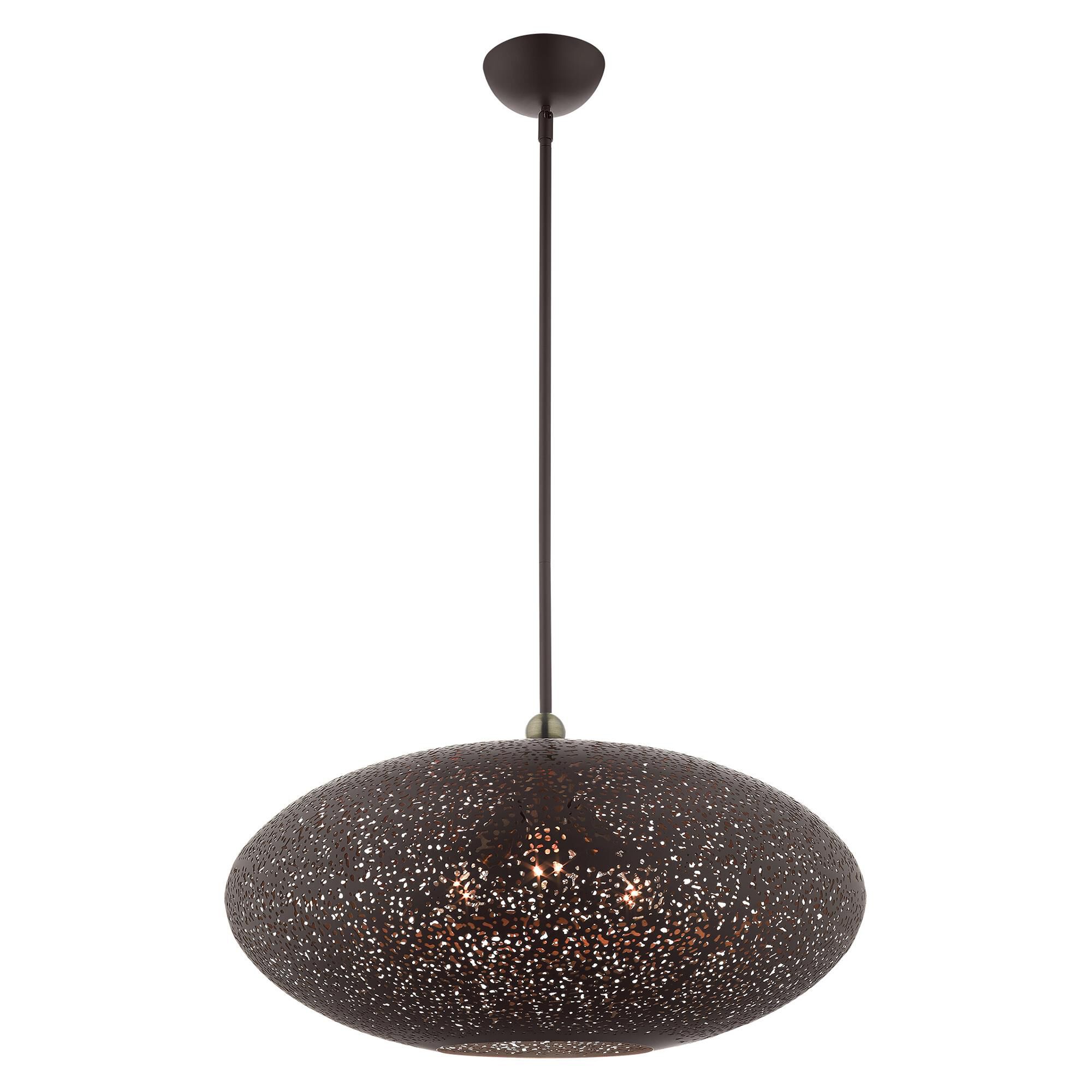 Shown in Black With Antique Brass Accents finish and Bronze Filigreed Ornamental Metal Shade With Gold Finish Inside glass and Bronze Filigreed Ornamental Metal  With Gold Finish Inside shade