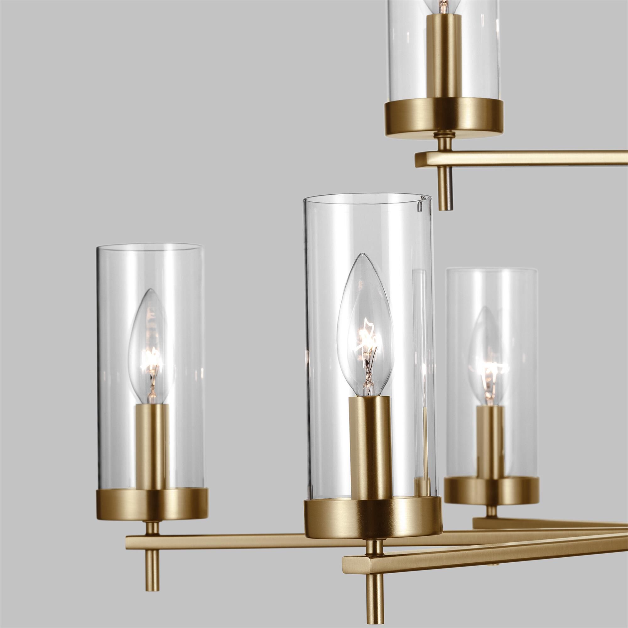 Shown in Satin Brass finish and Clear Glass s shade