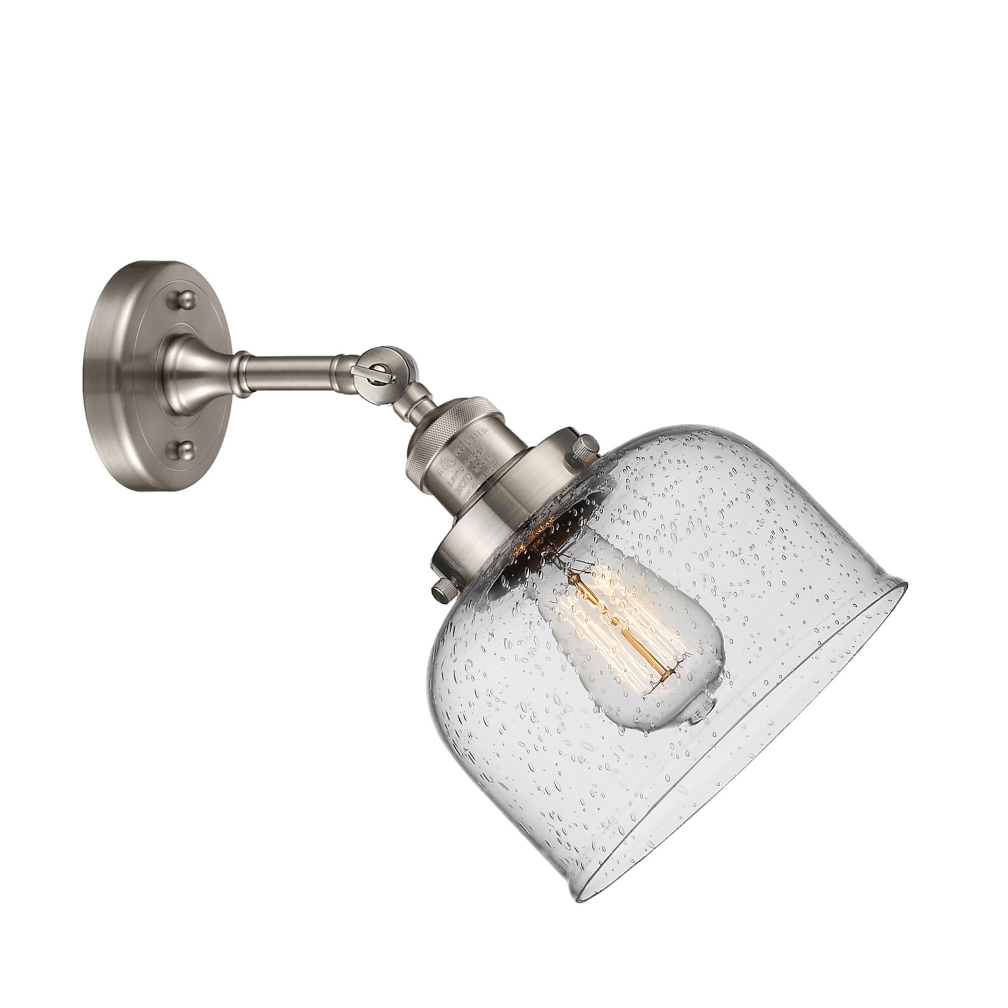 Shown in Brushed Satin Nickel finish and Seedy glass and None accent