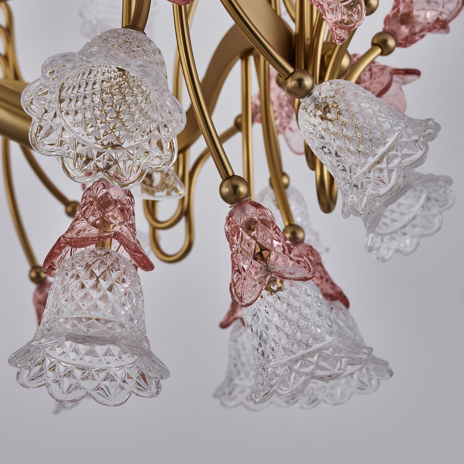 Shown in Antique Brass finish and Vintage Rose crystal