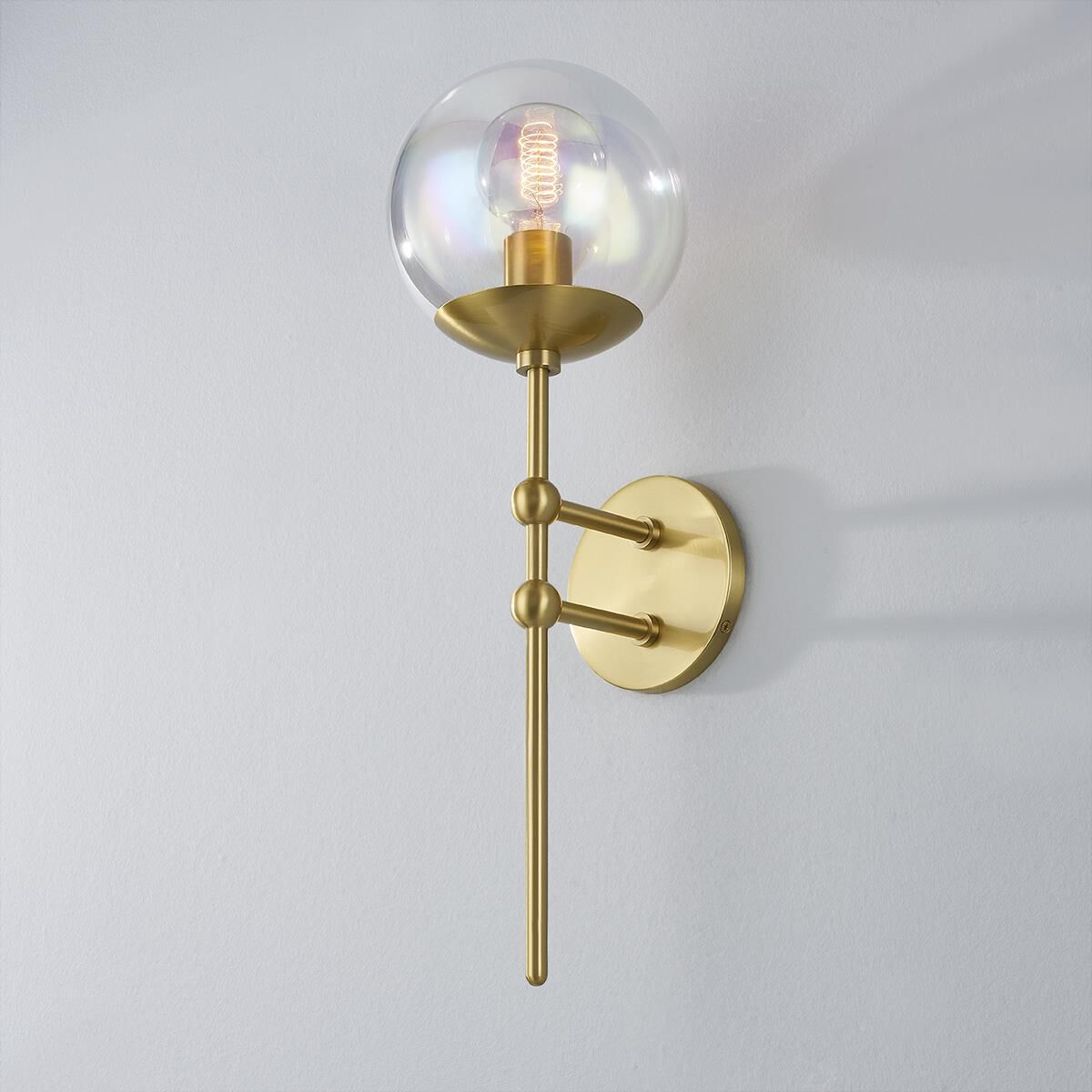 Shown in Aged Brass finish and Clear Plated Iridescent glass