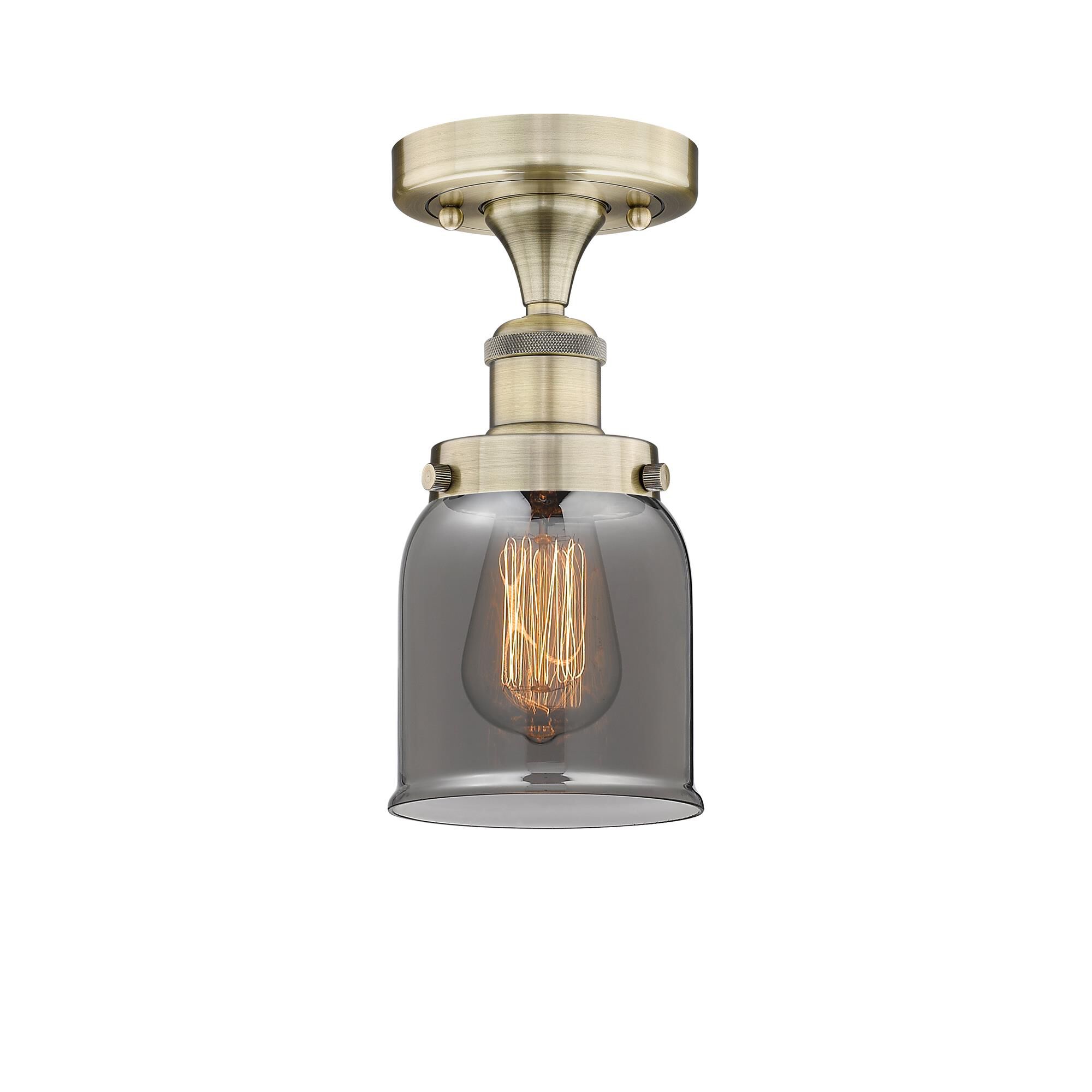 Shown in Antique Brass finish and Plated Smoke glass