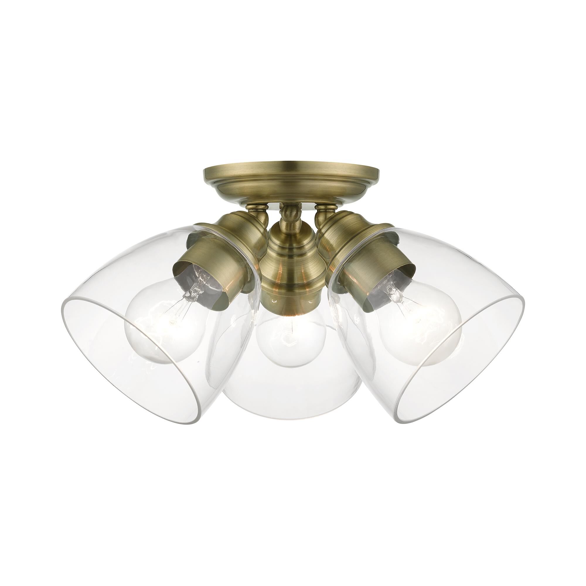 Shown in Antique Brass finish and Hand Blown Clear glass