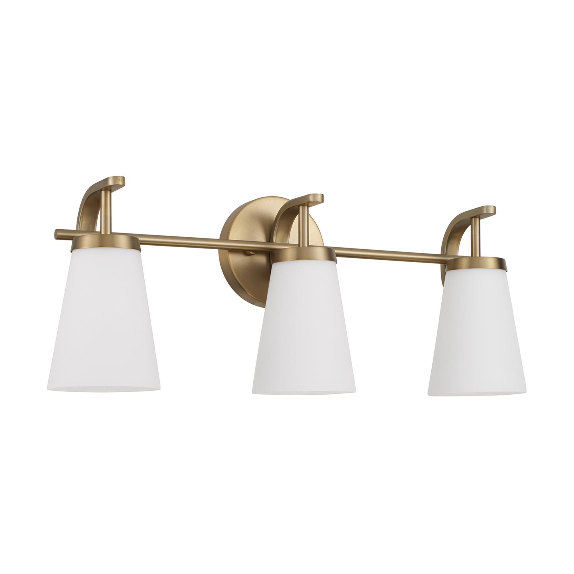 Shown in Aged Brass finish and Soft White glass