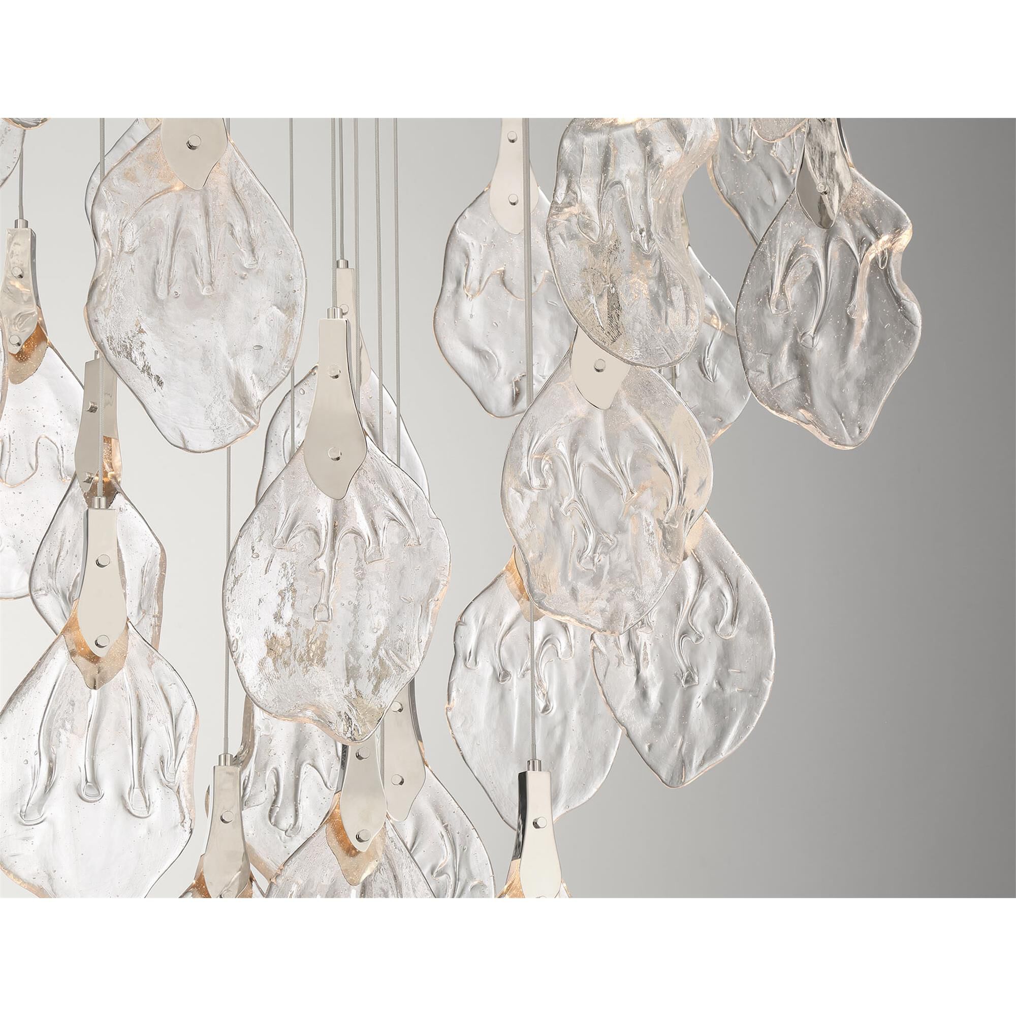 Shown in Polished Nickel finish and Clear Organic glass