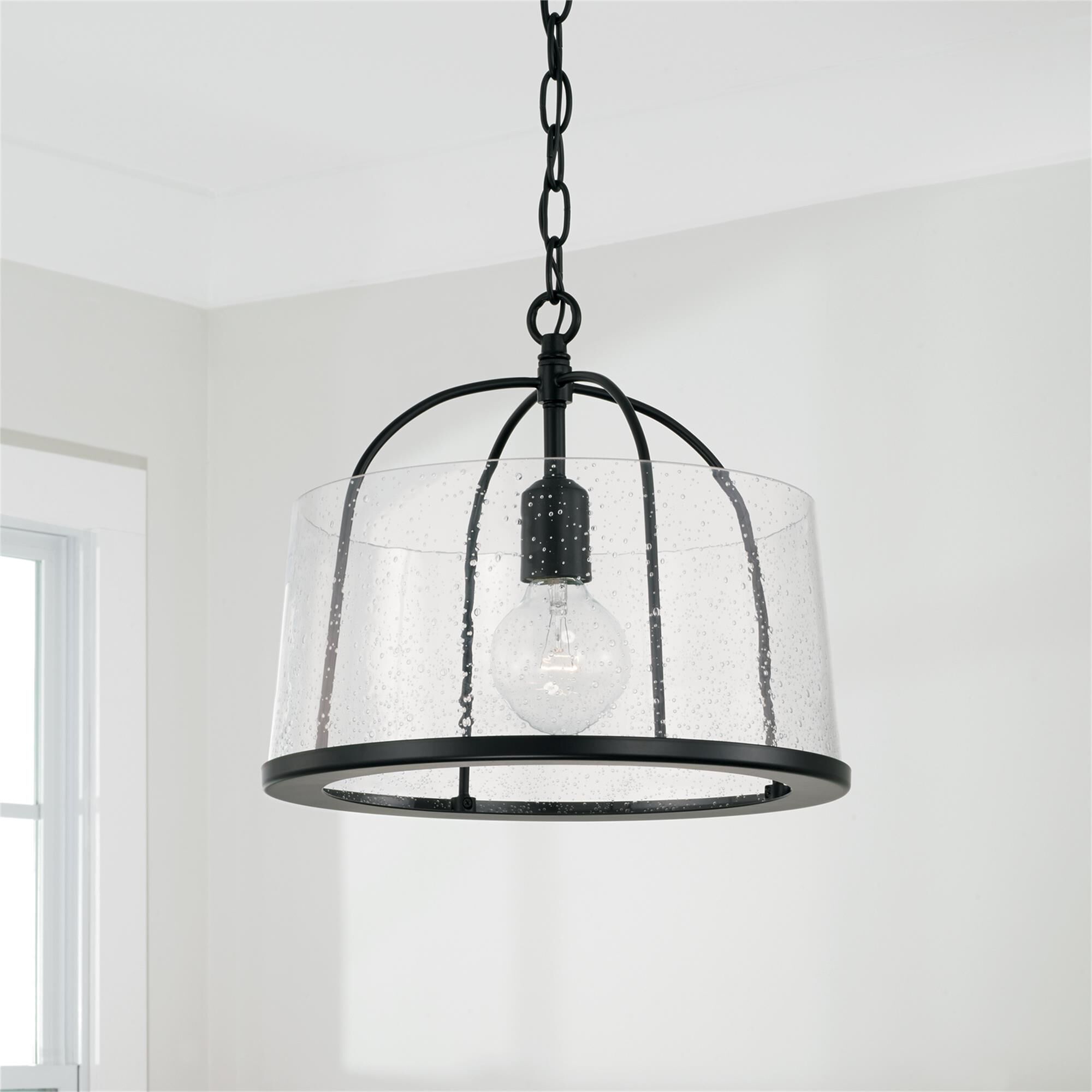 Shown in Matte Black finish and Clear Seeded glass