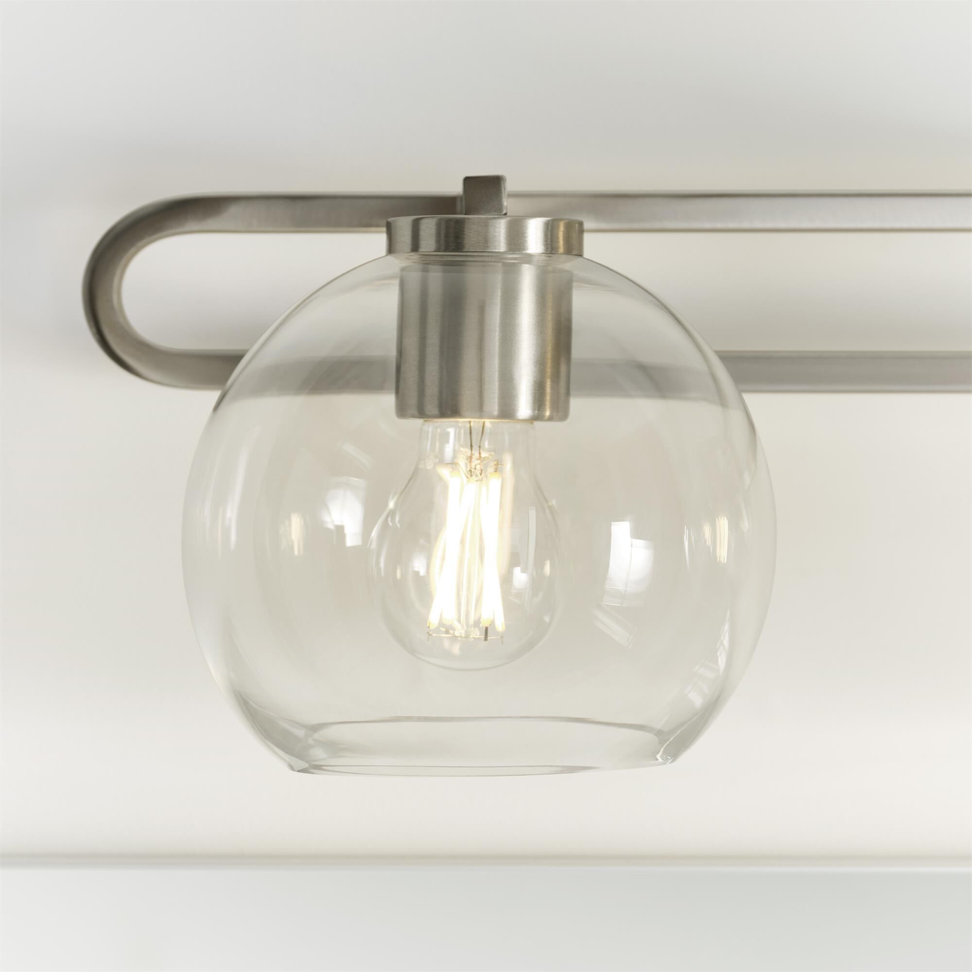 Shown in Brushed Nickel Silver finish and Clear glass