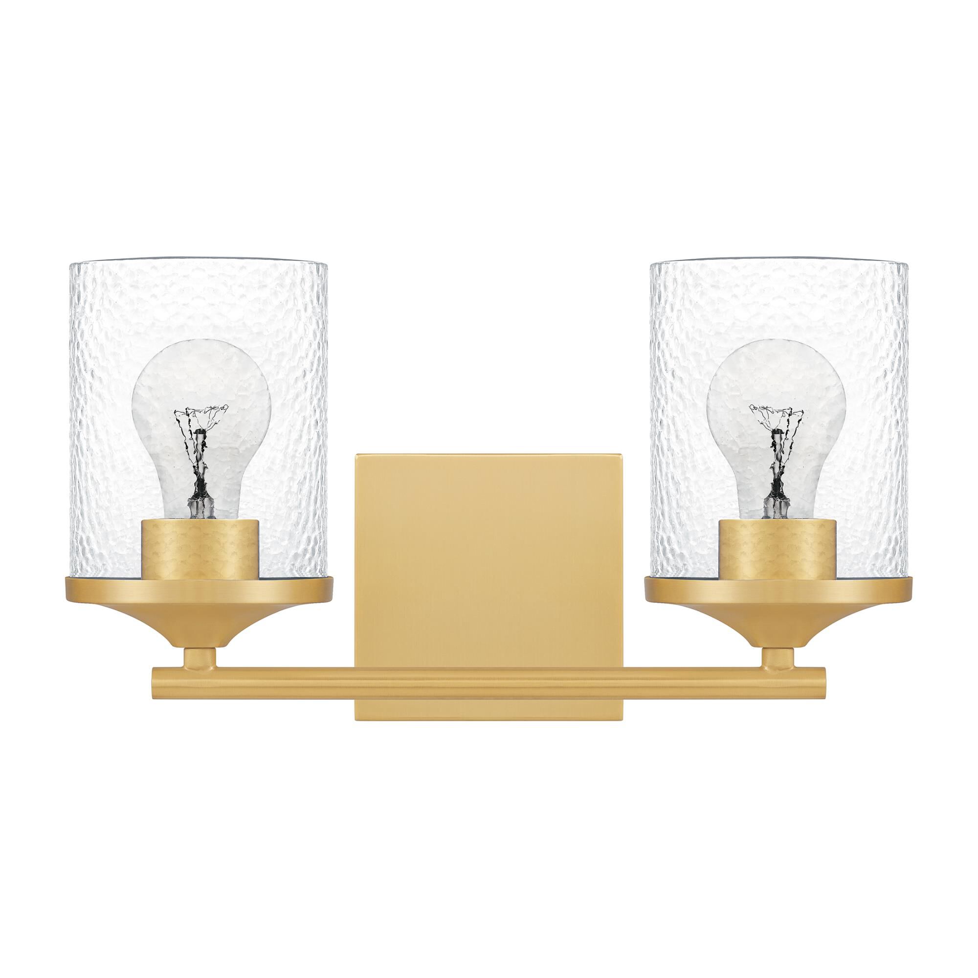 Shown in Aged Brass finish and Clear Hammered Glass shade