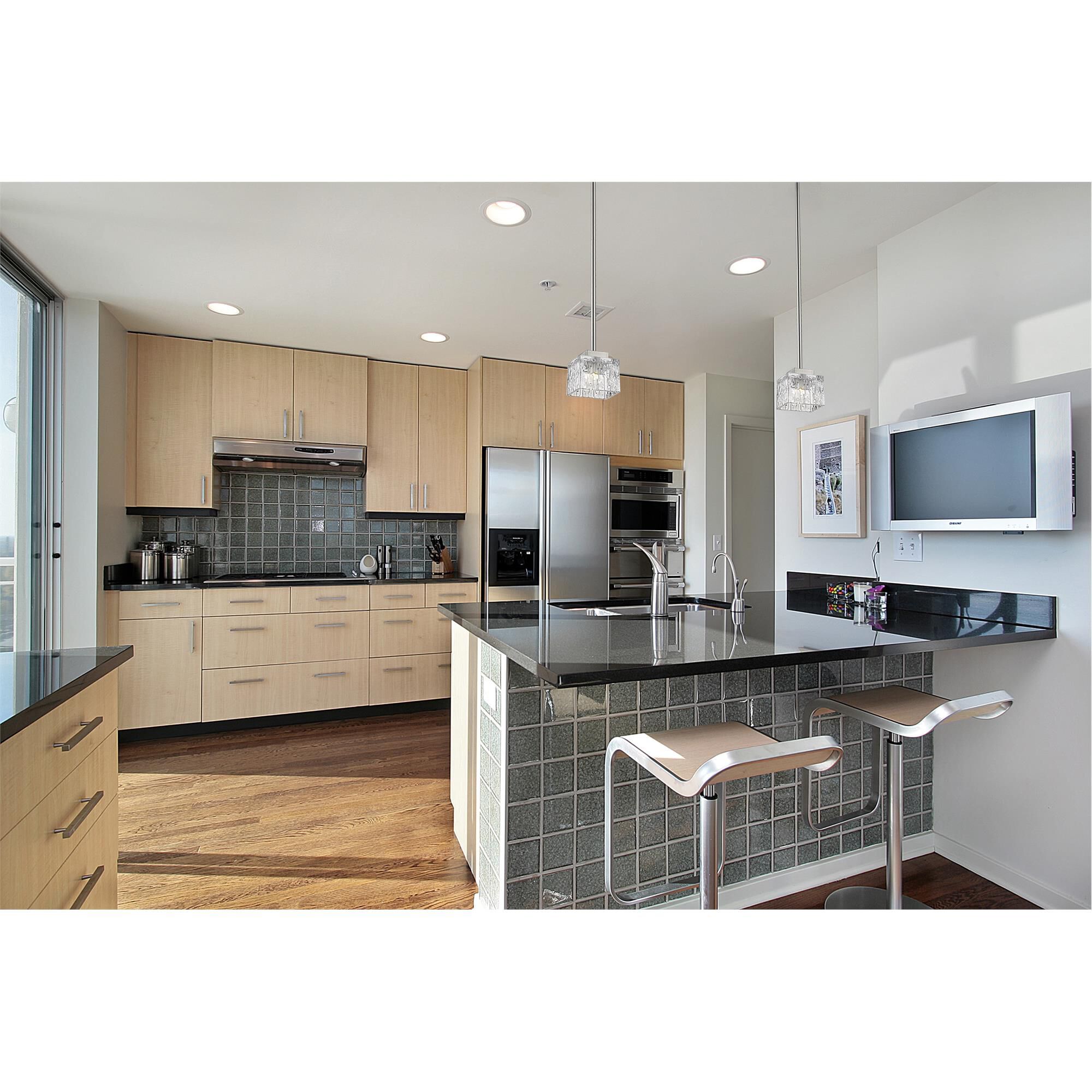 Shown in Brushed Nickel finish and Glass shade