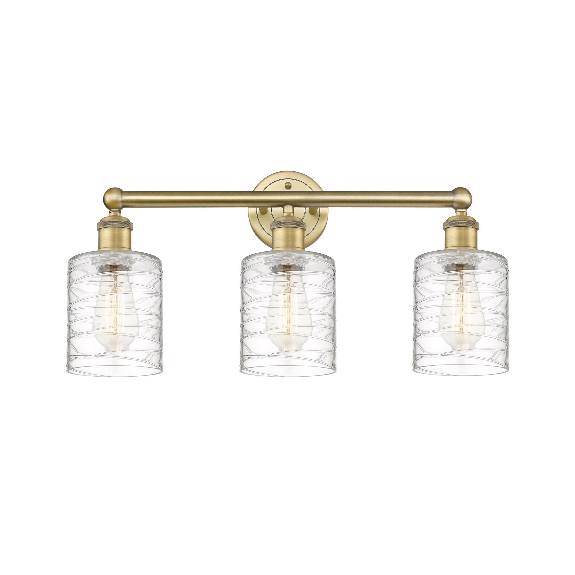Shown in Brushed Brass finish and Deco Swirl glass