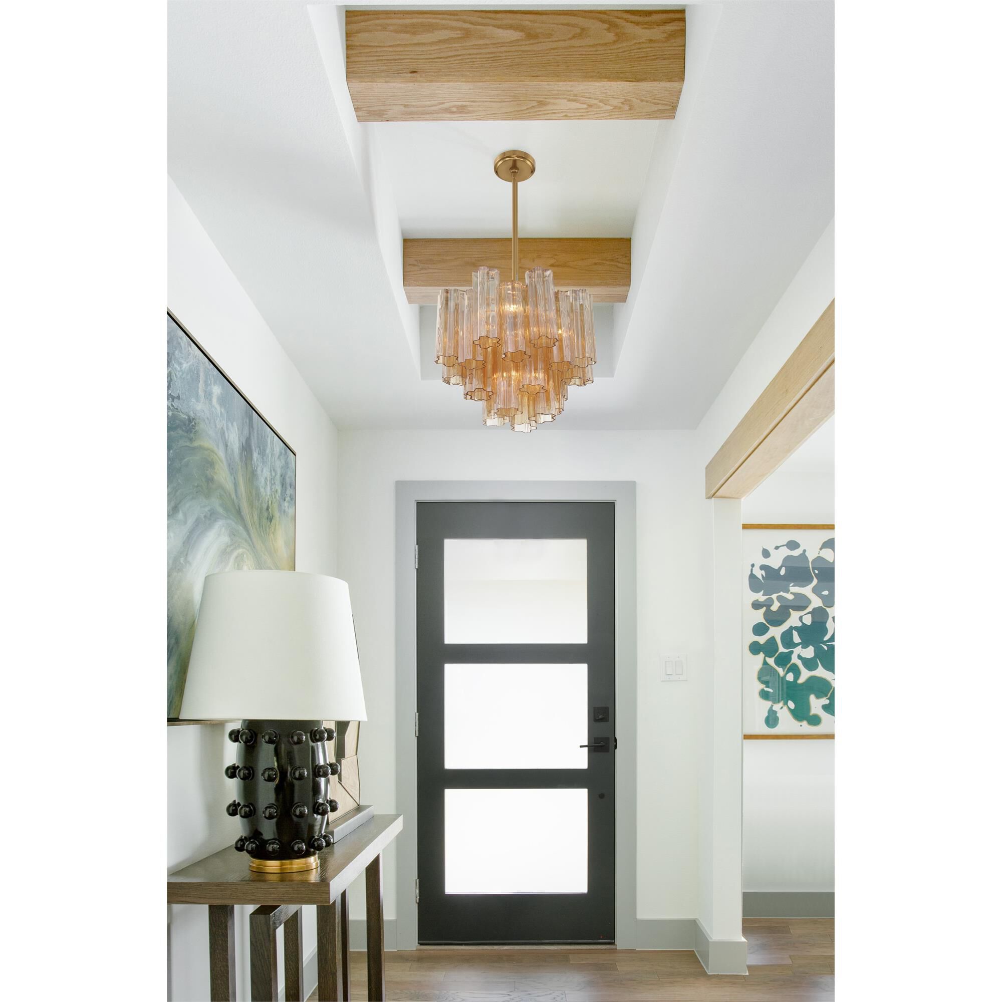 Shown in Aged Brass finish and Tronchi Amber glass