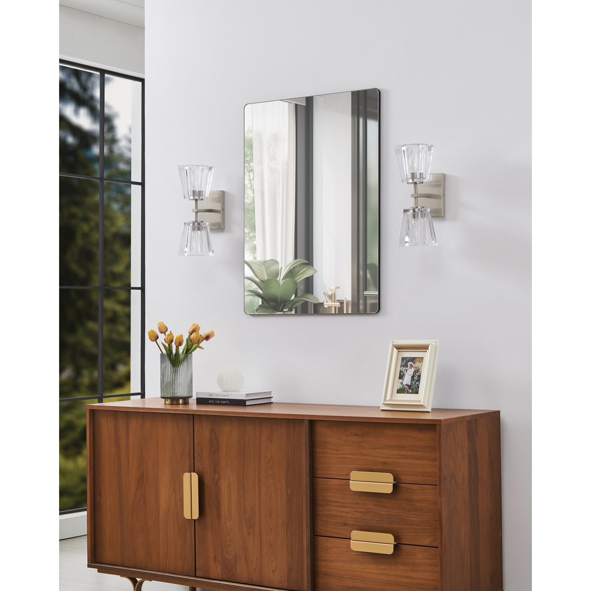 Shown in Brushed Nickel finish and Clear Pressed glass