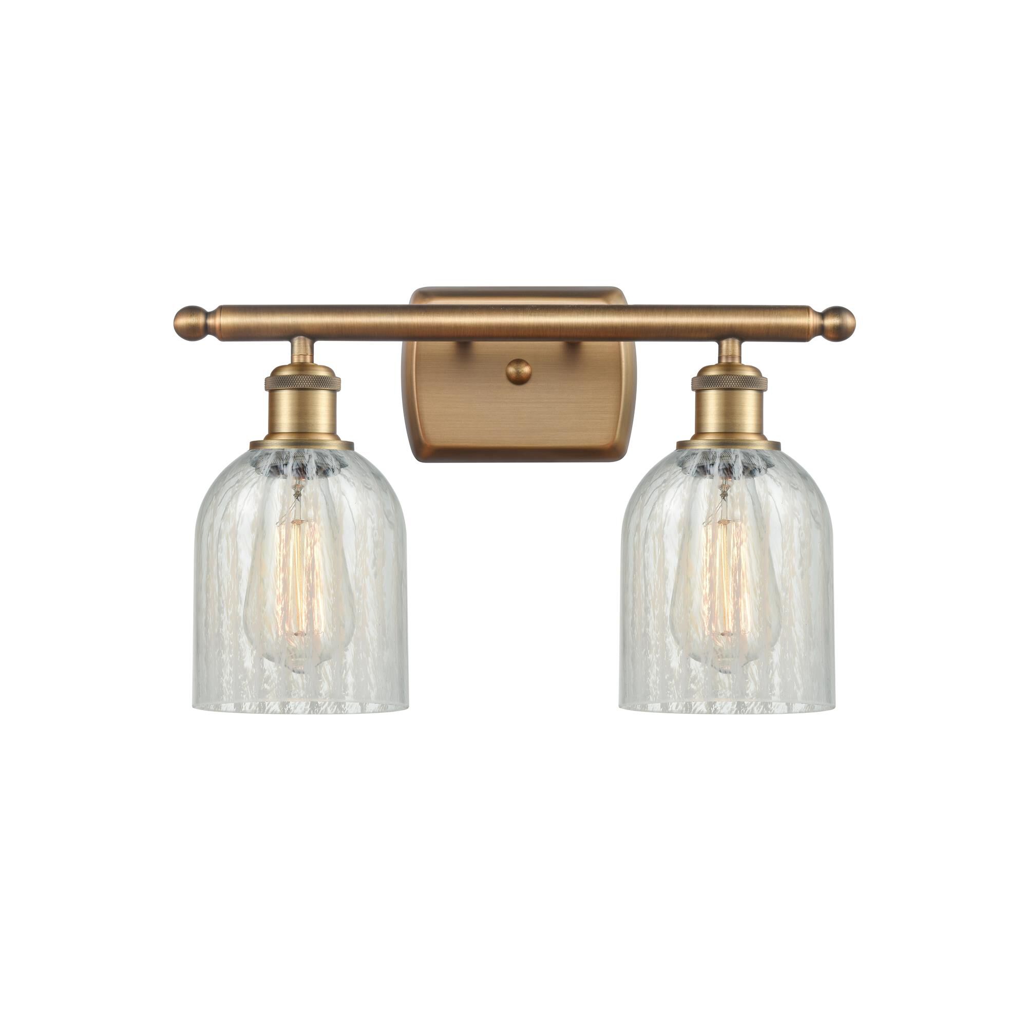Shown in Brushed Brass finish and Bell glass and Glass shade