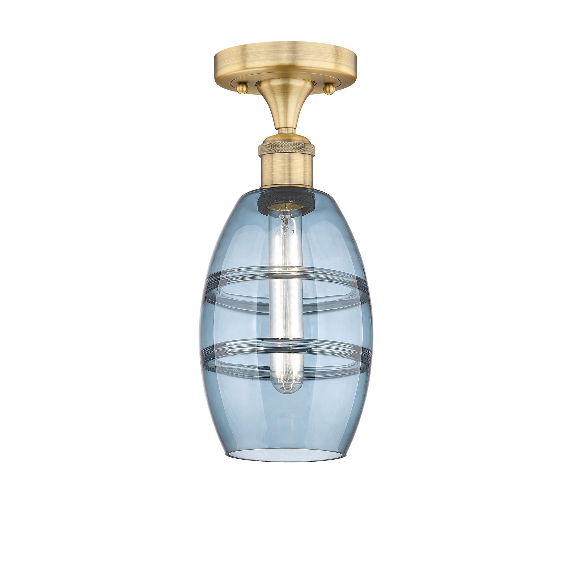Shown in Brushed Brass finish and Princess Blue glass
