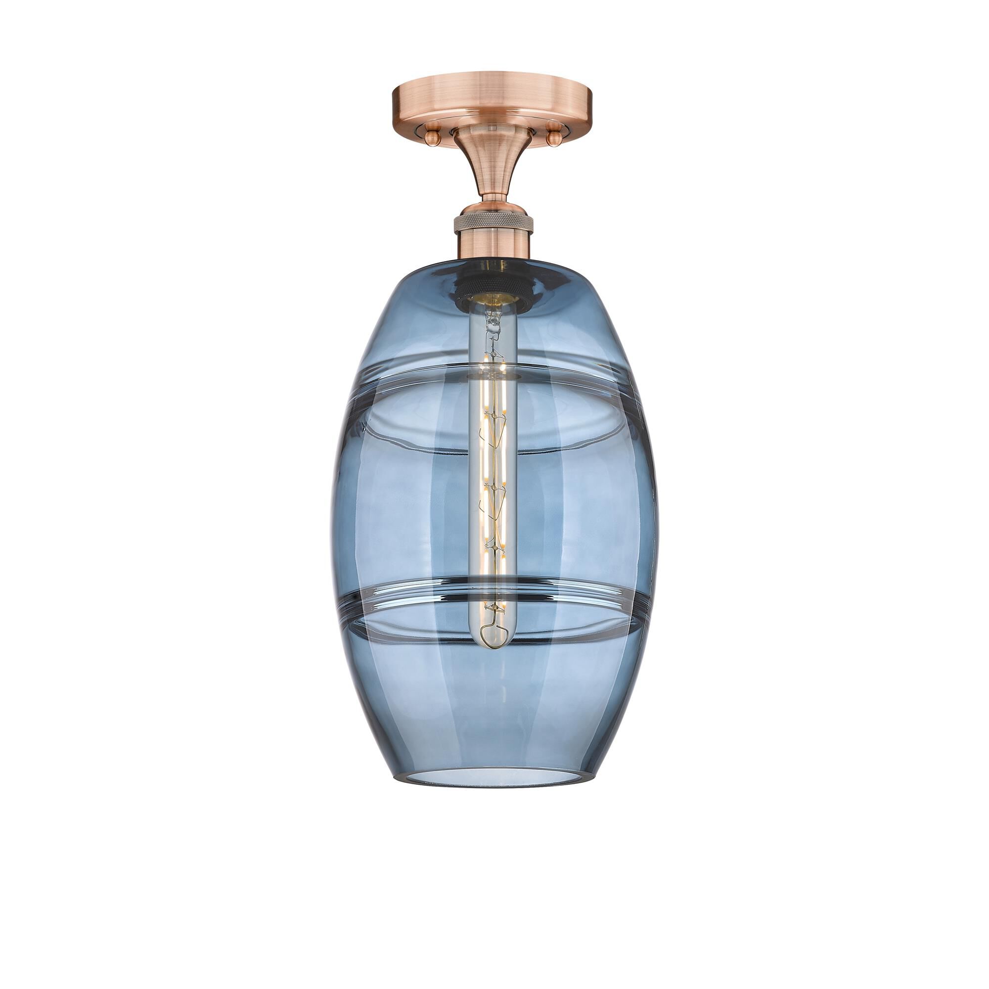 Shown in Antique Copper finish and Princess Blue glass